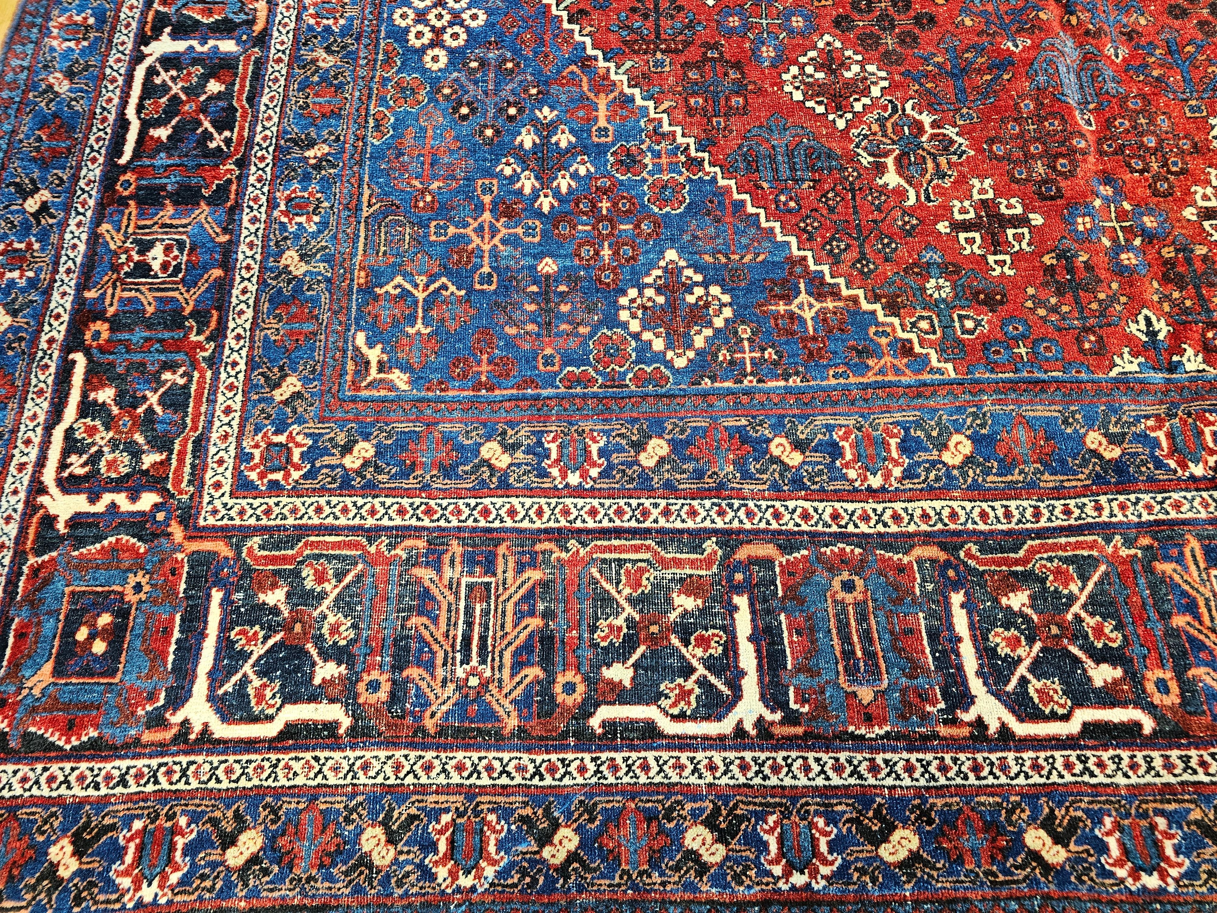 Wool Vintage Persian Joshegan Rug in a Geometric Pattern in Rust Red, French Blue For Sale