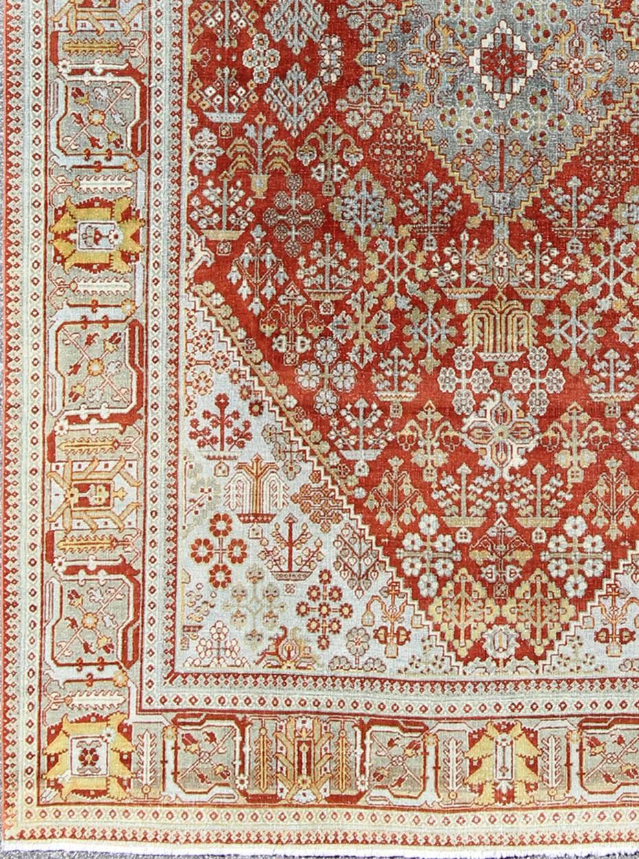 Antique Persian Joshegan rug with geometric medallion design in rust/red and ivory, Keivan Woven Arts / rug 17-0807, country of origin / type: Iran / Joshegan, circa 1930

This antique Joshegan rug from 1930's Iran was handwoven and bears a