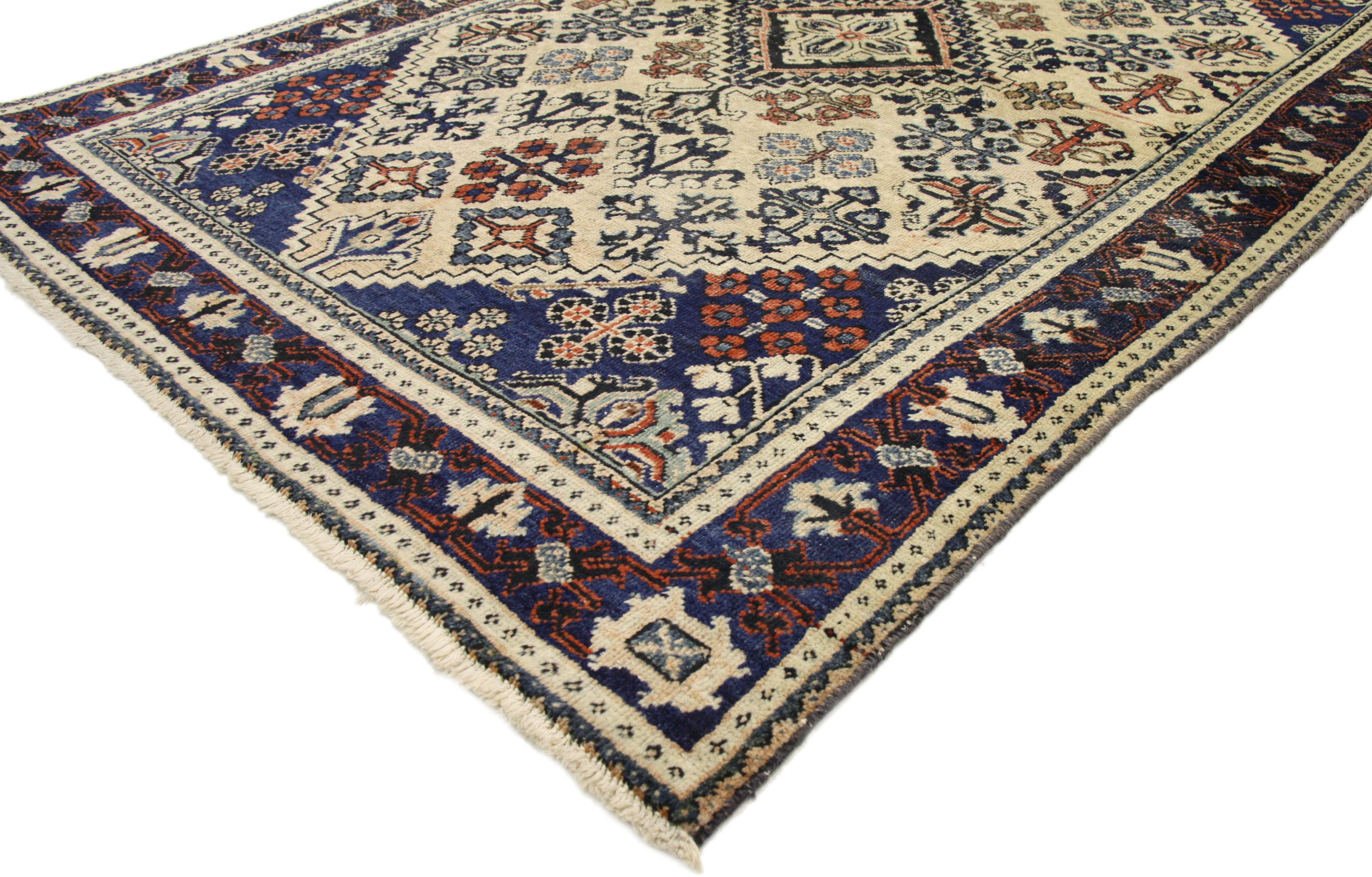 75217, vintage Persian Joshegan rug. With brilliant blues and warm beige colors inspired by Italy combined with modern and rustic, this hand knotted Persian Joshegan rug is well-balanced and poised to impress. It features a central lozenge medallion