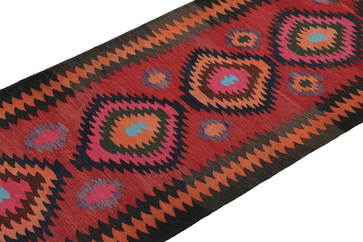 This vintage 4x12 Persian Kilim is a tribal Karadagh rug — named after the mountainous region known for its fabulous works. Handwoven in wool, it originates circa 1950-1960.

On the Design: 

The rug carries interesting orange-pink medallions on