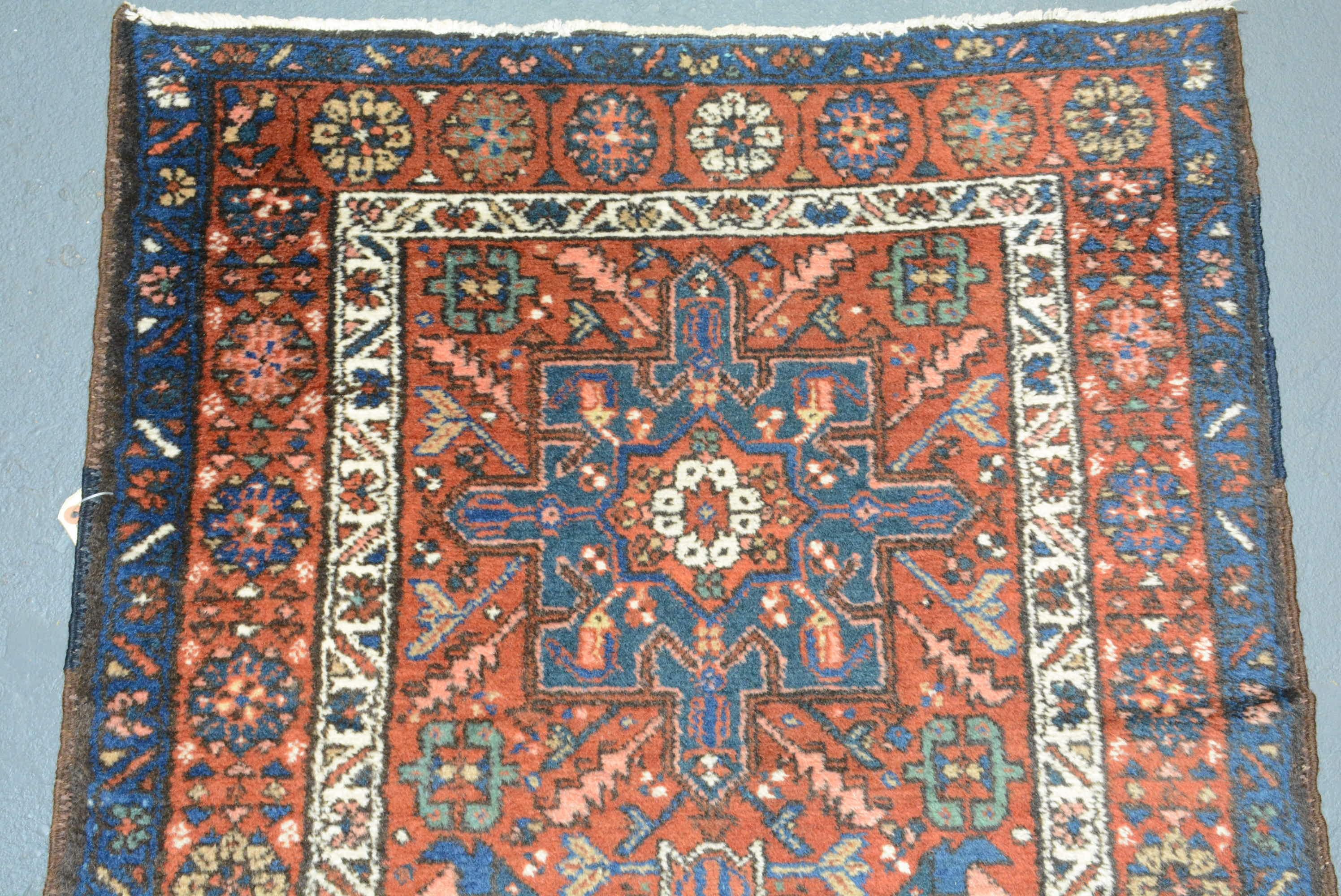 Persian Karadja rugs and runners are woven in the northwestern part of the country in a small village. These rugs are usually produced in runner formats, but room-size carpets are woven here as well. They are influenced by the designs and