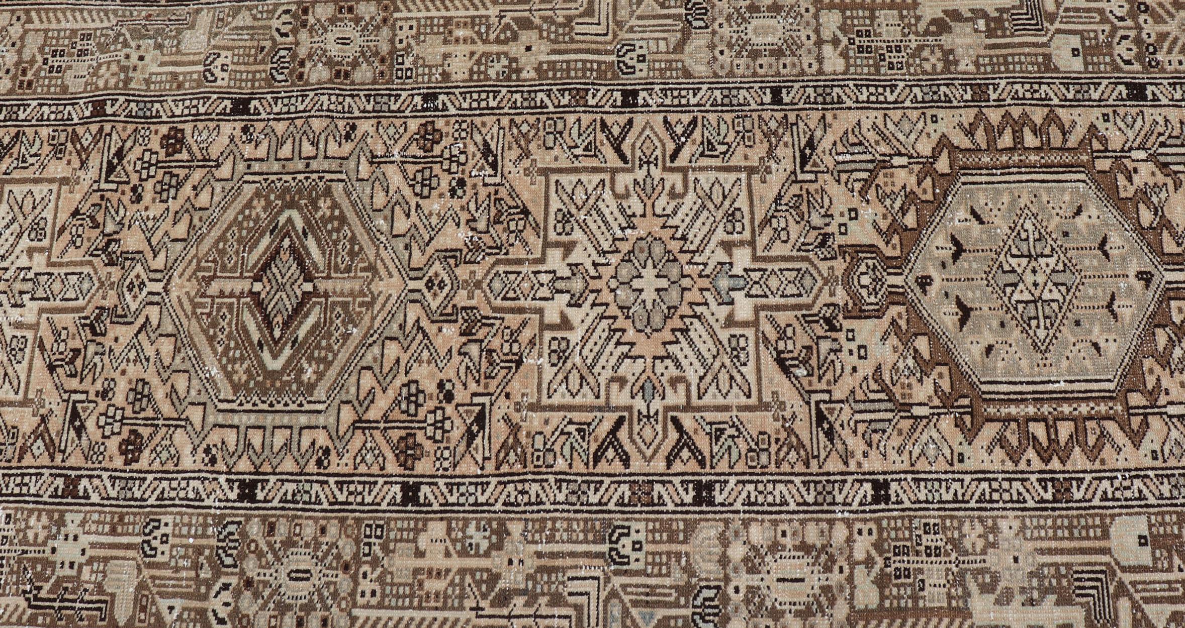 20th Century Vintage Persian Karadjeh Long Runner with Medallion Design in Natural Wool Tones For Sale