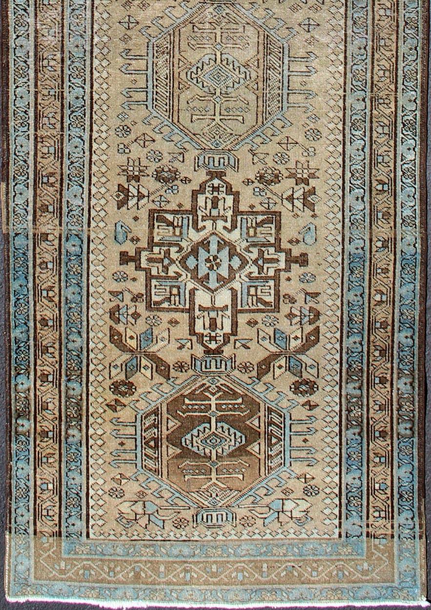 Karadjeh vintage runner with multi-medallion design from Persia, rug h-307-80, country of origin / type: Iran / Karadjeh, circa 1950

This magnificent Persian Karadjeh from the mid-20th century bears an exquisite design rendered in subdued tones.