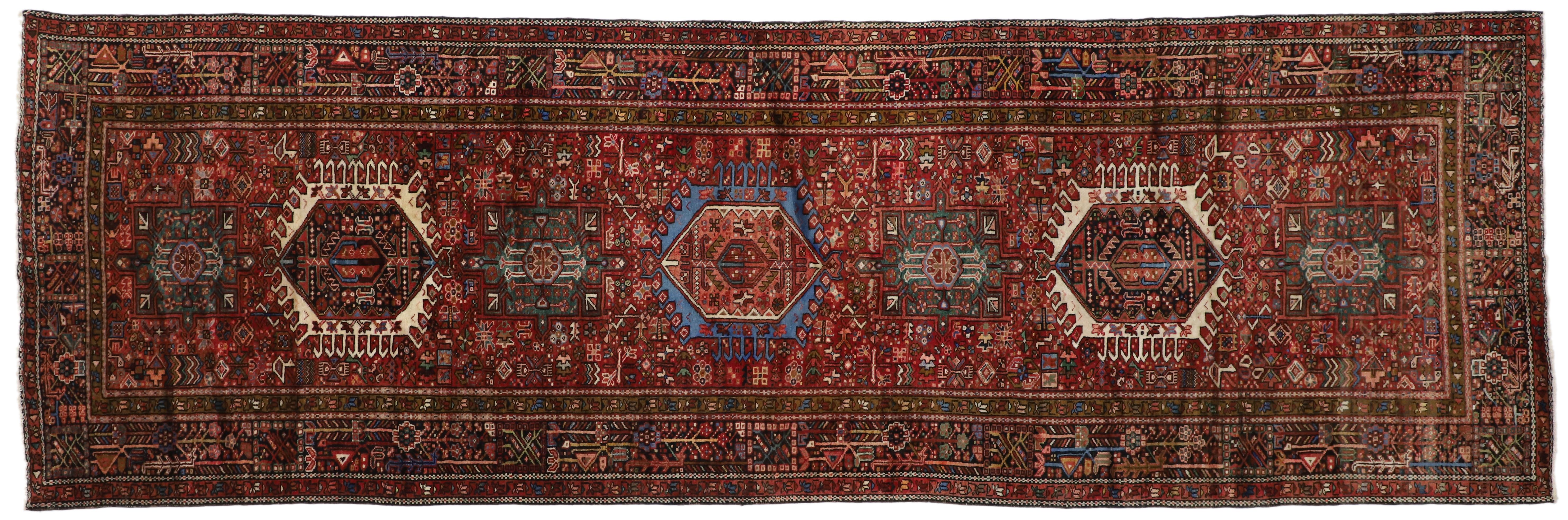 76004 Vintage Persian Karaja Heriz Gallery Rug, Wide Hallway Runner Tribal Style. With timeless appeal, refined colors, and architectural design elements, this hand knotted wool antique Persian Karaja Heriz gallery rug can beautifully blend