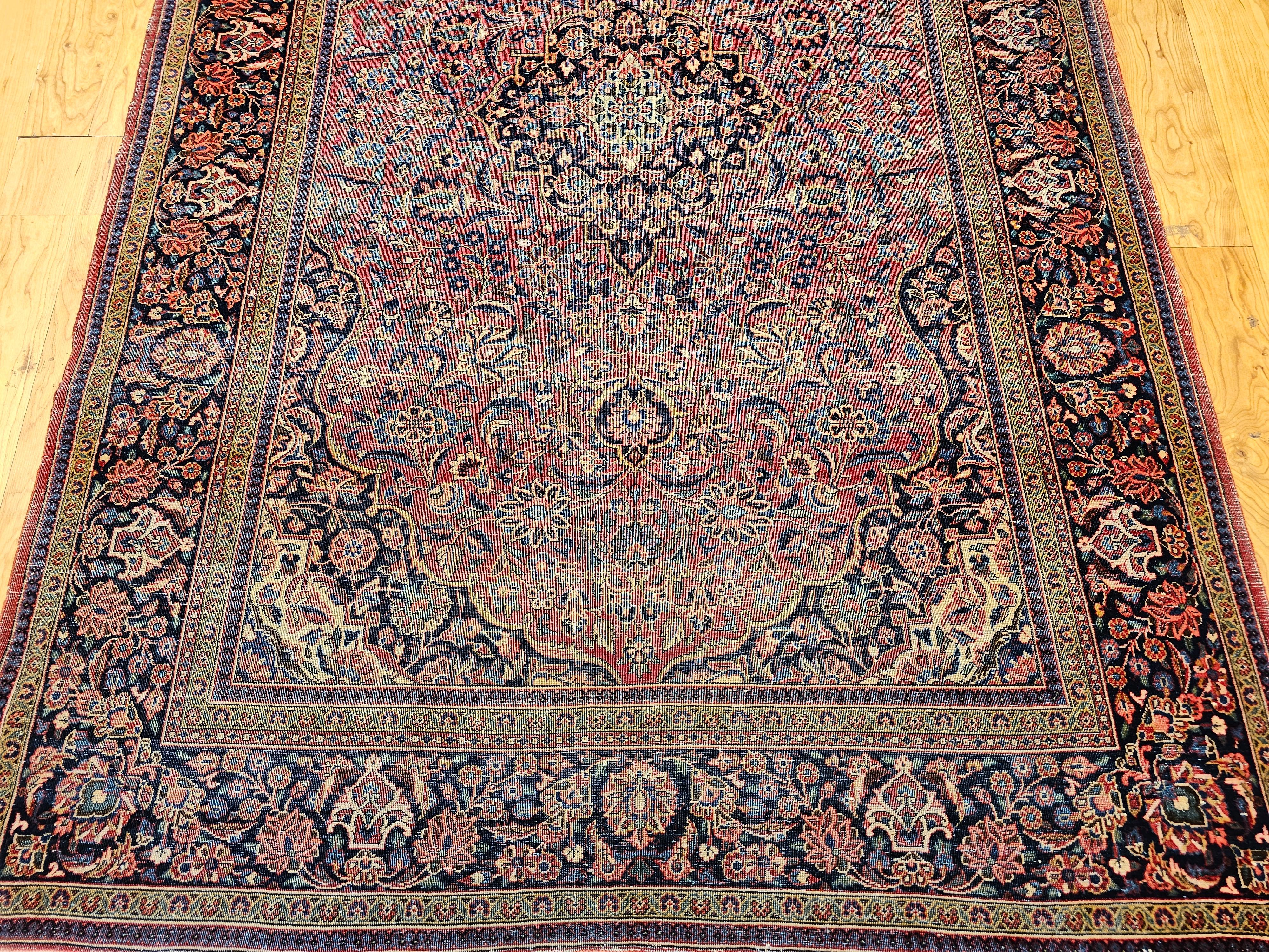 Persiano Tappeto persiano Kashan dei primi del '900 con disegno floreale in borgogna e blu navy in vendita