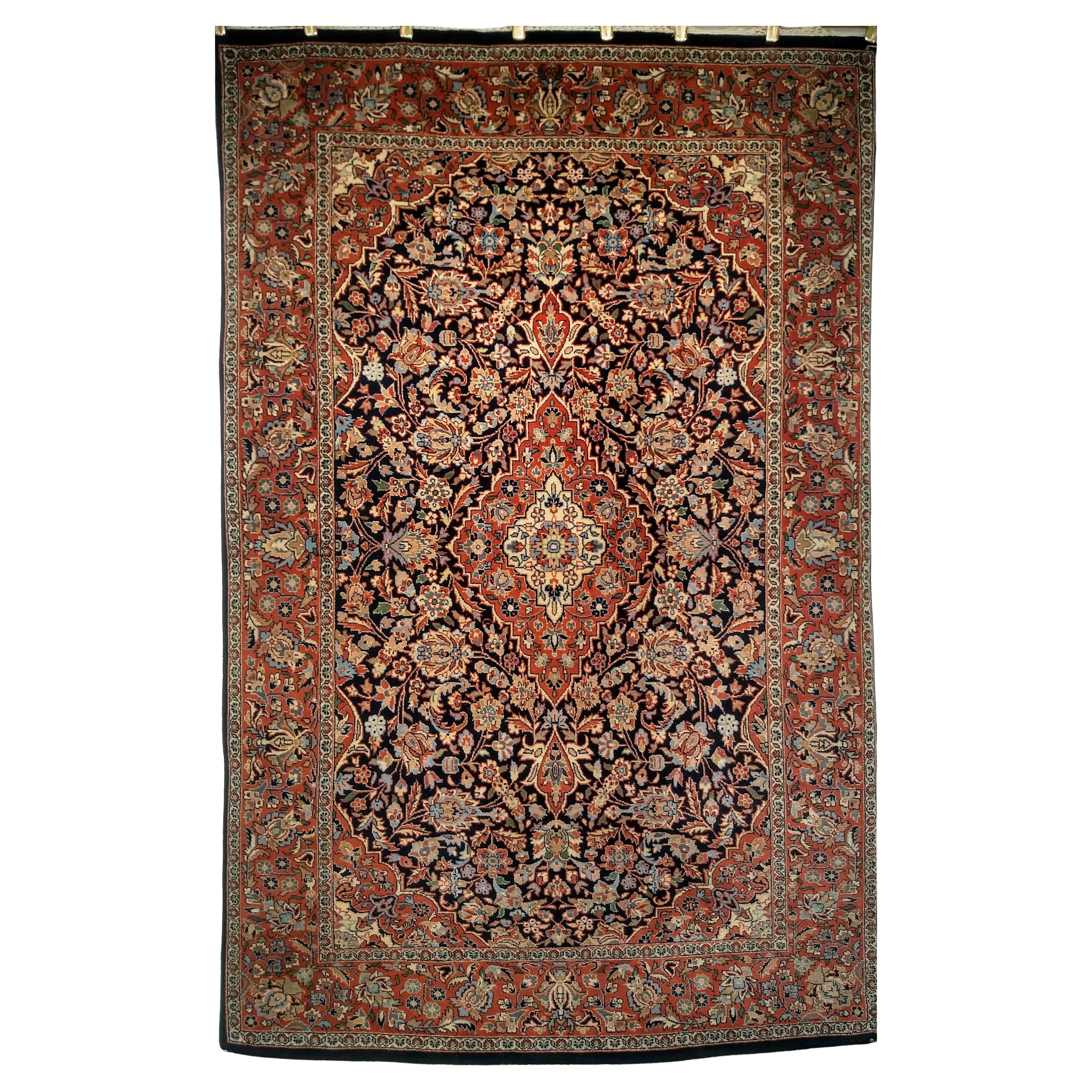 Alfombra Persa Kashan Vintage con motivos florales en azul marino, teja, azul y verde