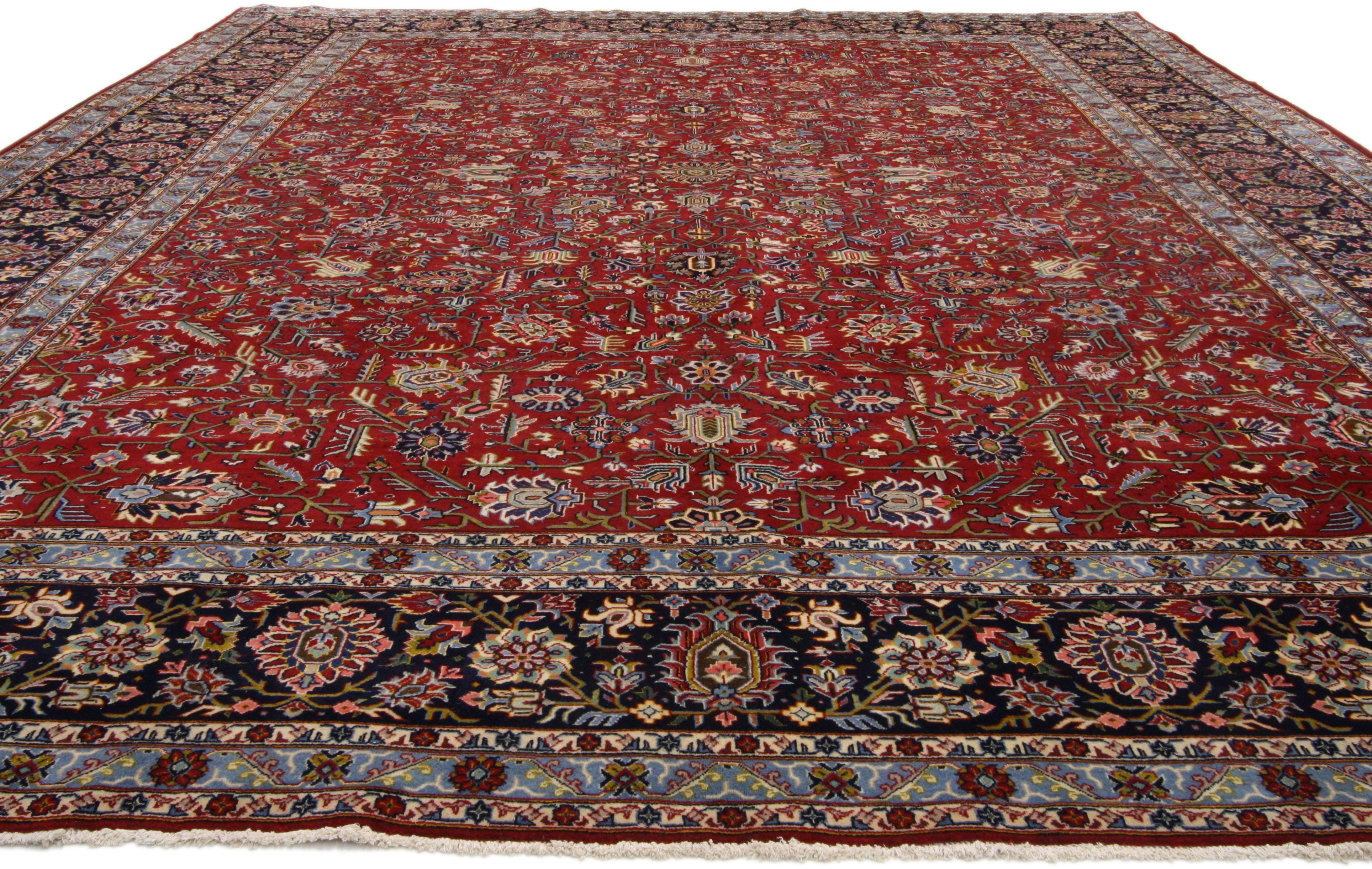 76265, vintage Persian Kashan area rug with traditional style. This hand-knotted wool vintage Persian Kashan area rug features an all-over botanical pattern composed of lotus, palmettes and angular vines on a red field surrounded by a Classic ink