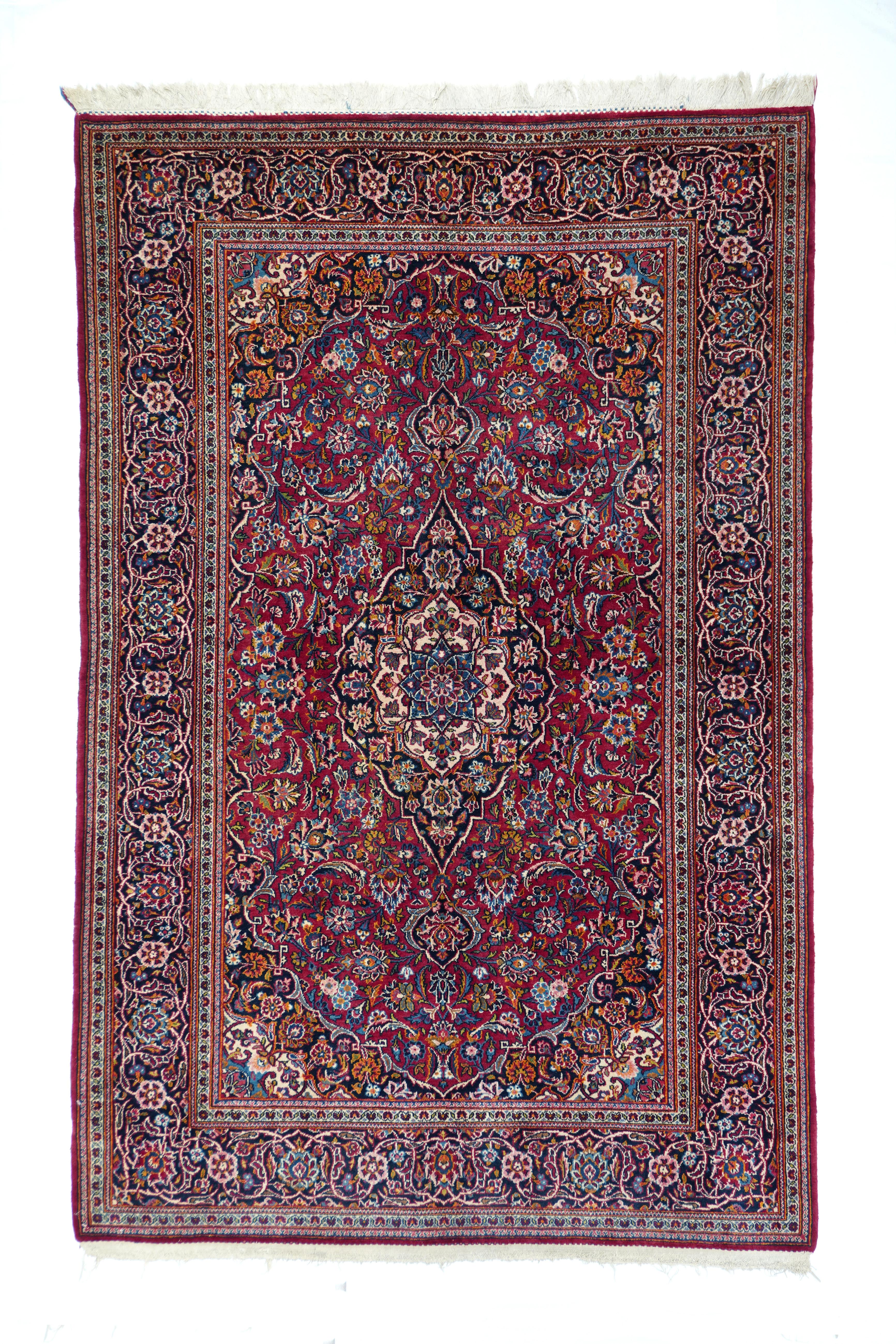 Antique Kashan carpets are among the finest Persian rugs. They are woven in workshops of the city of Kashan, in north central Iran. Kashan was a hub of silk production since the Safavid dynasty, and has created some of the highest quality Persian