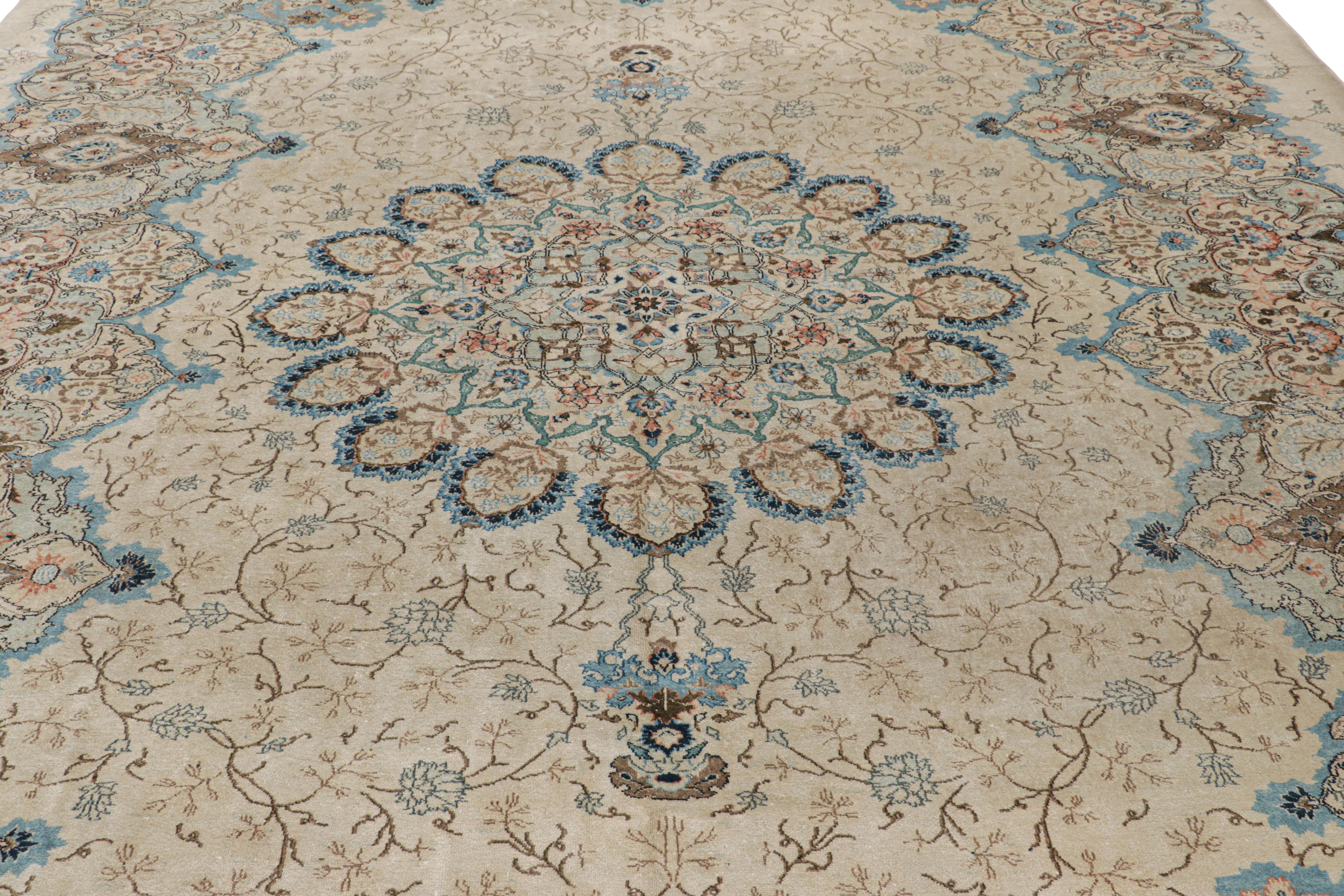 Hand-knotted in wool, this 10x14 vintage Persian Kashan rug, originating circa 1940-1950, features fine detail and equally fine weave that speak to an exemplary piece in its period. 

On the Design:

Admirers of the craft will appreciate this
