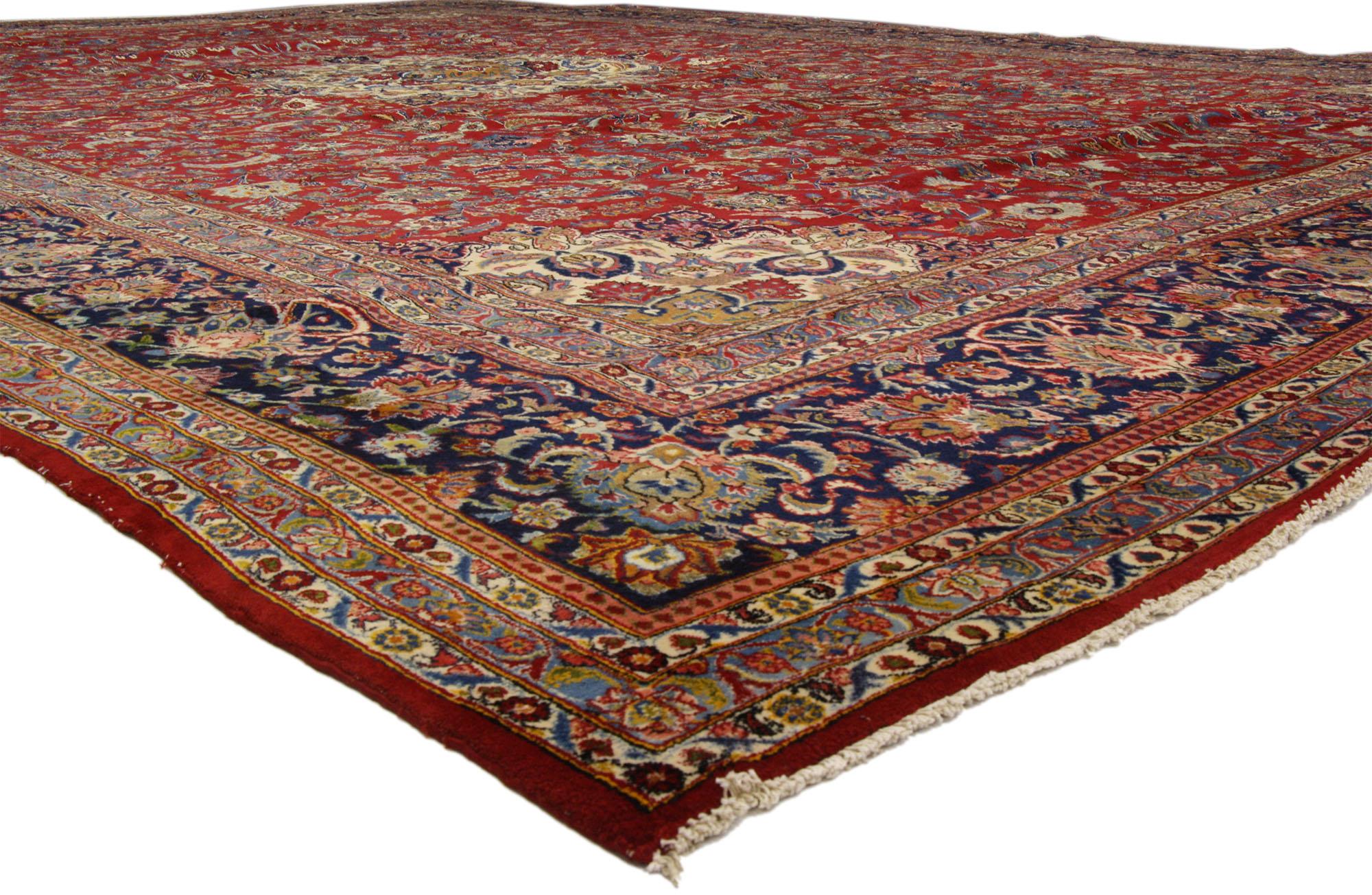 75650 Vintage Persian Kashan Palace Size Rug with Italian Rococo Style. This vintage Persian Kashan rug features a round floral 16-point medallion with elaborate corner spandrels and dense all-over floral pattern throughout the scarlet red field. It