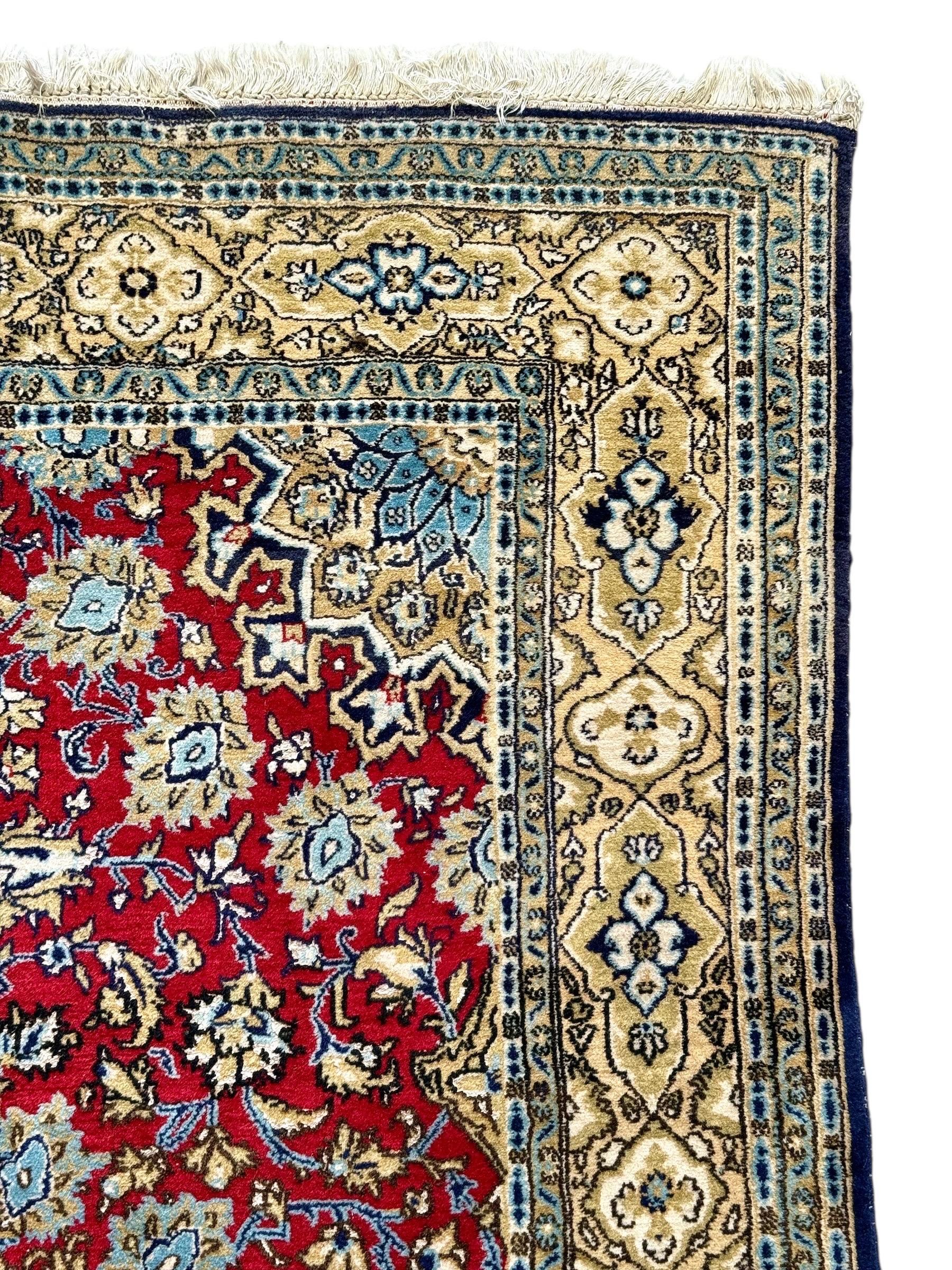 Hand-Woven Vintage Persian Kashan Wool Rug with Red Field and Floral Medallion For Sale