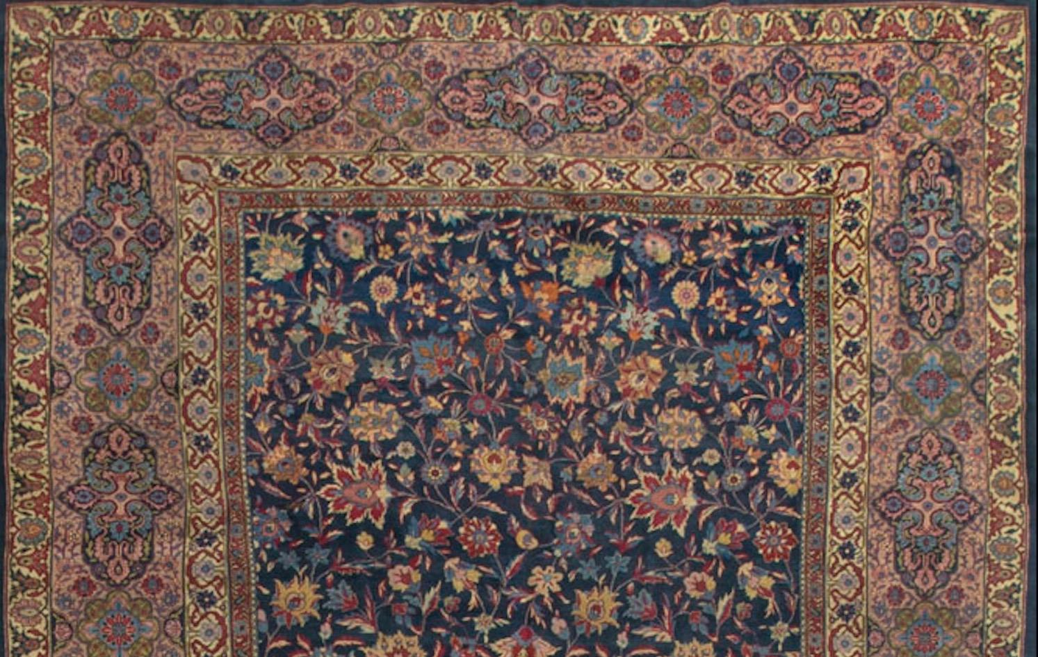 This antique Persian Kazvin rug, dating back to circa 1940, showcases a refined and detailed design typical of the region. Kazvin rugs often feature intricate floral motifs and geometric patterns. The central field of this rug likely exhibits a