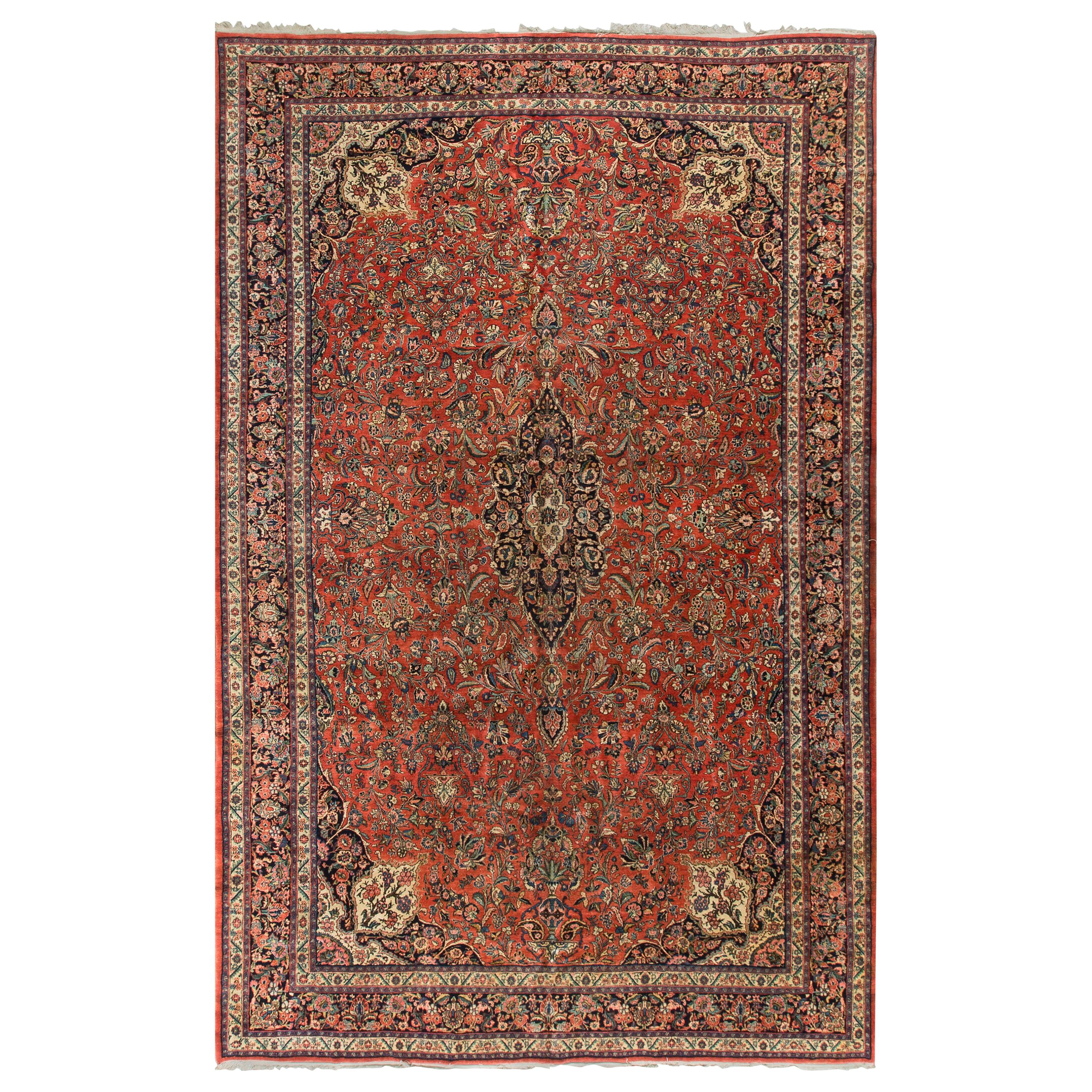 Antiquité - Tapis persan Kazvin rouge / marine, circa 1930, taille 10'9 x 15'8