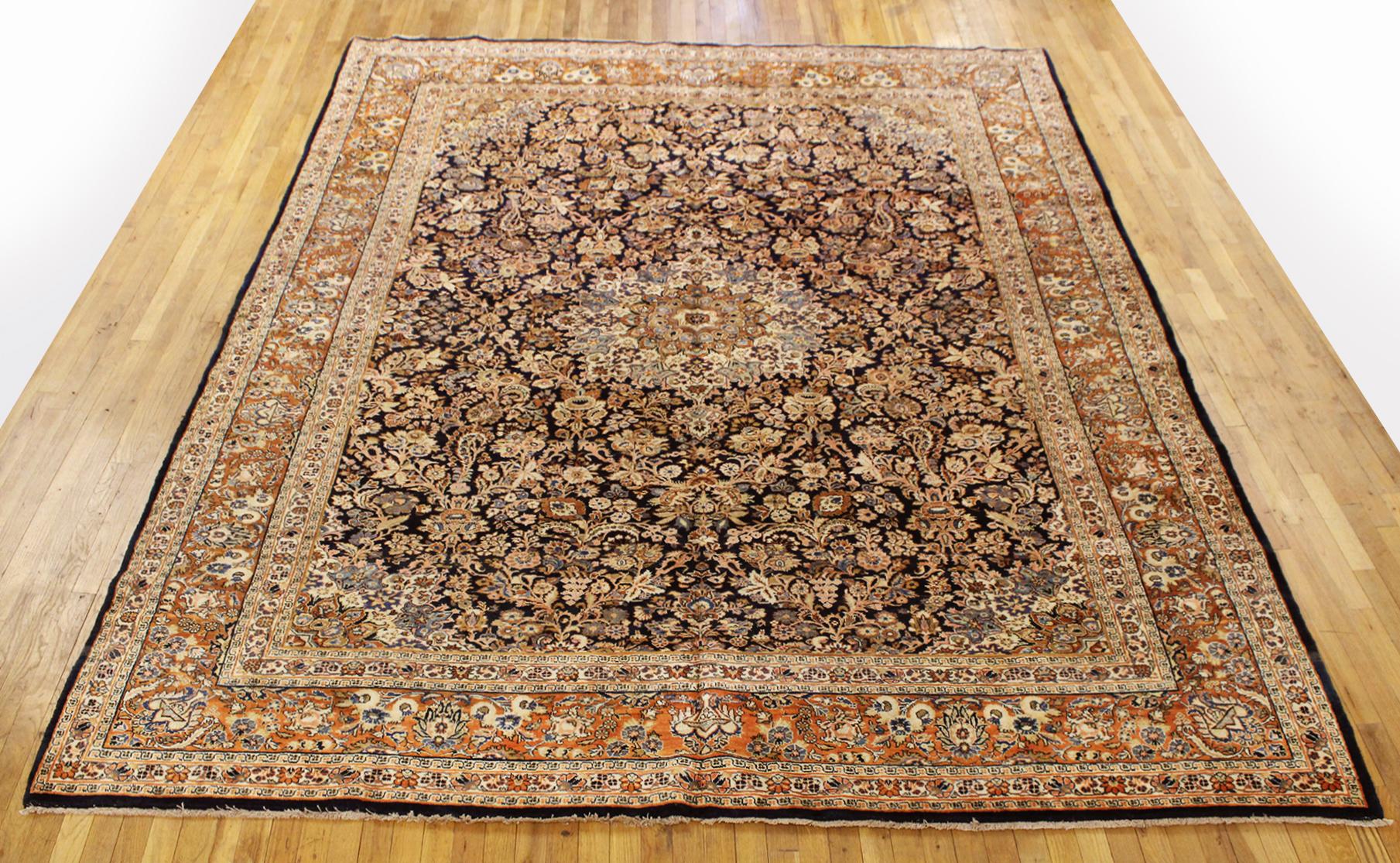 Vintage Persian Kazvin rug, in Room size, circa 1930. 

A one-of-a-kind vintage Hand-Knotted Persian Kazvin Oriental Carpet, with soft wool pile. This lovely hand-knotted wool rug features floral elements allover the blue primary field, with a soft