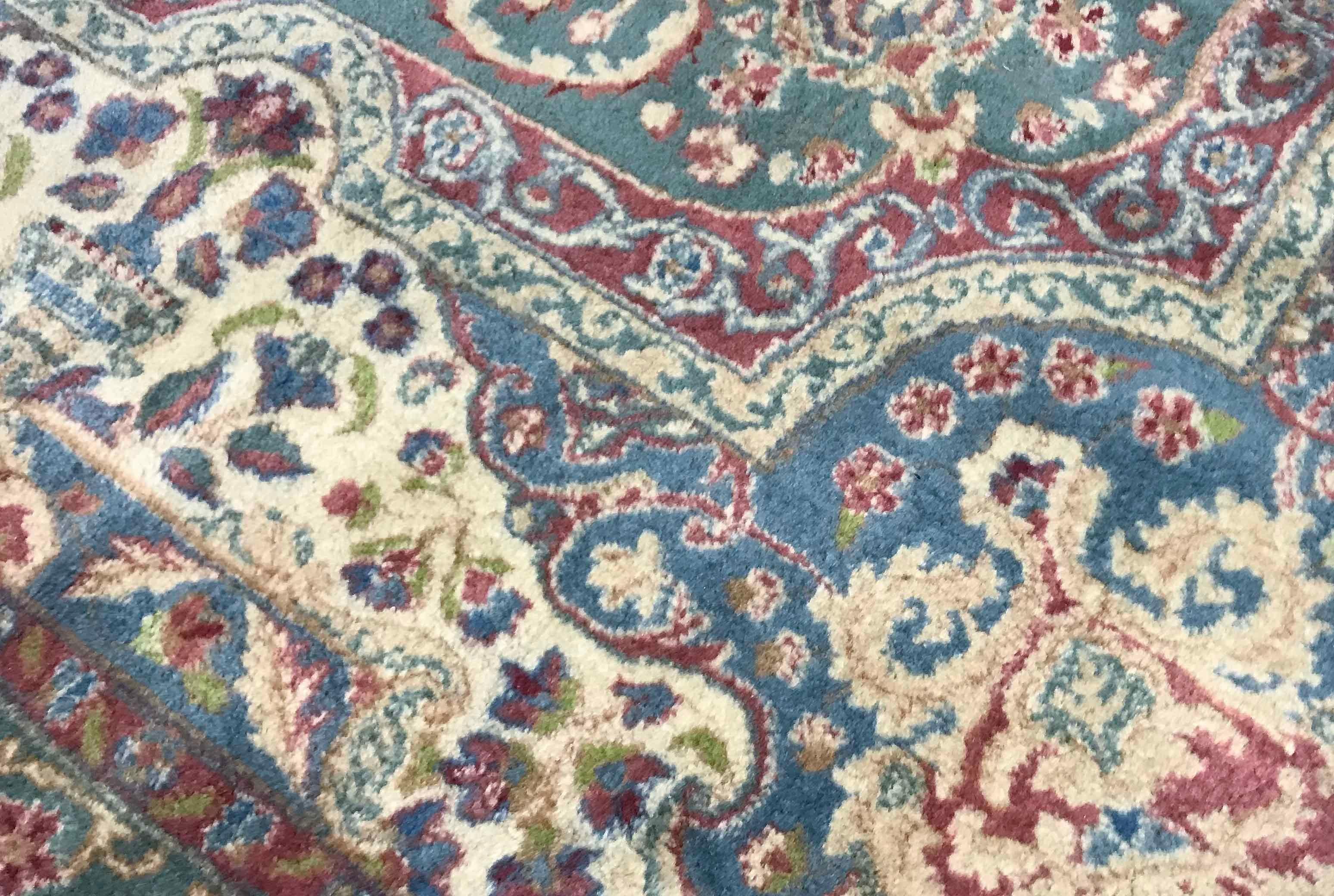Vintage Persian Kerman, circa 1940. A Kerman rug with a soft blue ground having a light multicolored central design repeated in the borders this rug will create a sense of style and character to any area it is placed. Size: 8'3 x 10'5.