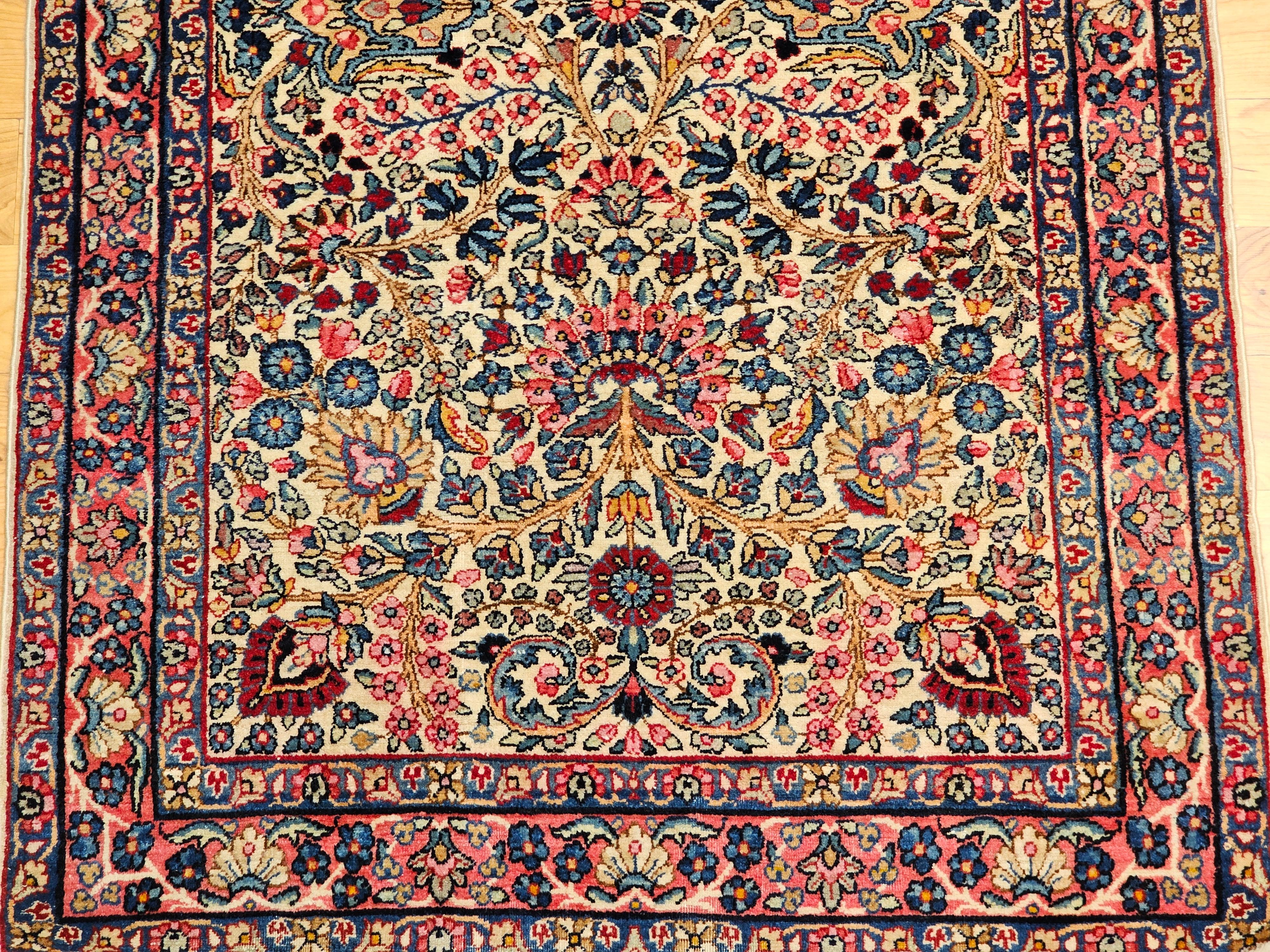 Hand-Woven Vintage Persian Kerman Lavar Area Rug in Ivory, Blue, Pink, Red, Yellow For Sale
