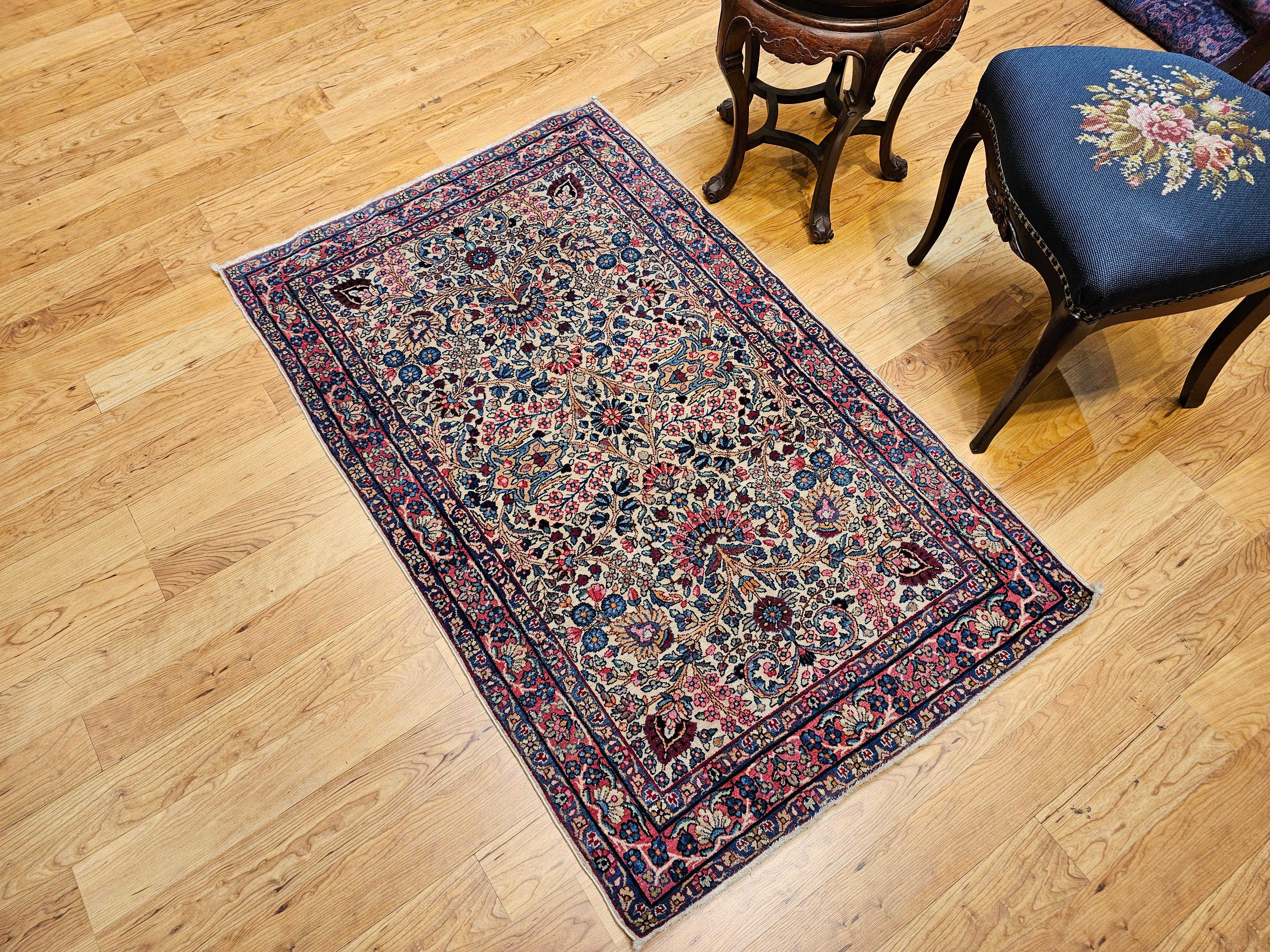 Wool Vintage Persian Kerman Lavar Area Rug in Ivory, Blue, Pink, Red, Yellow For Sale