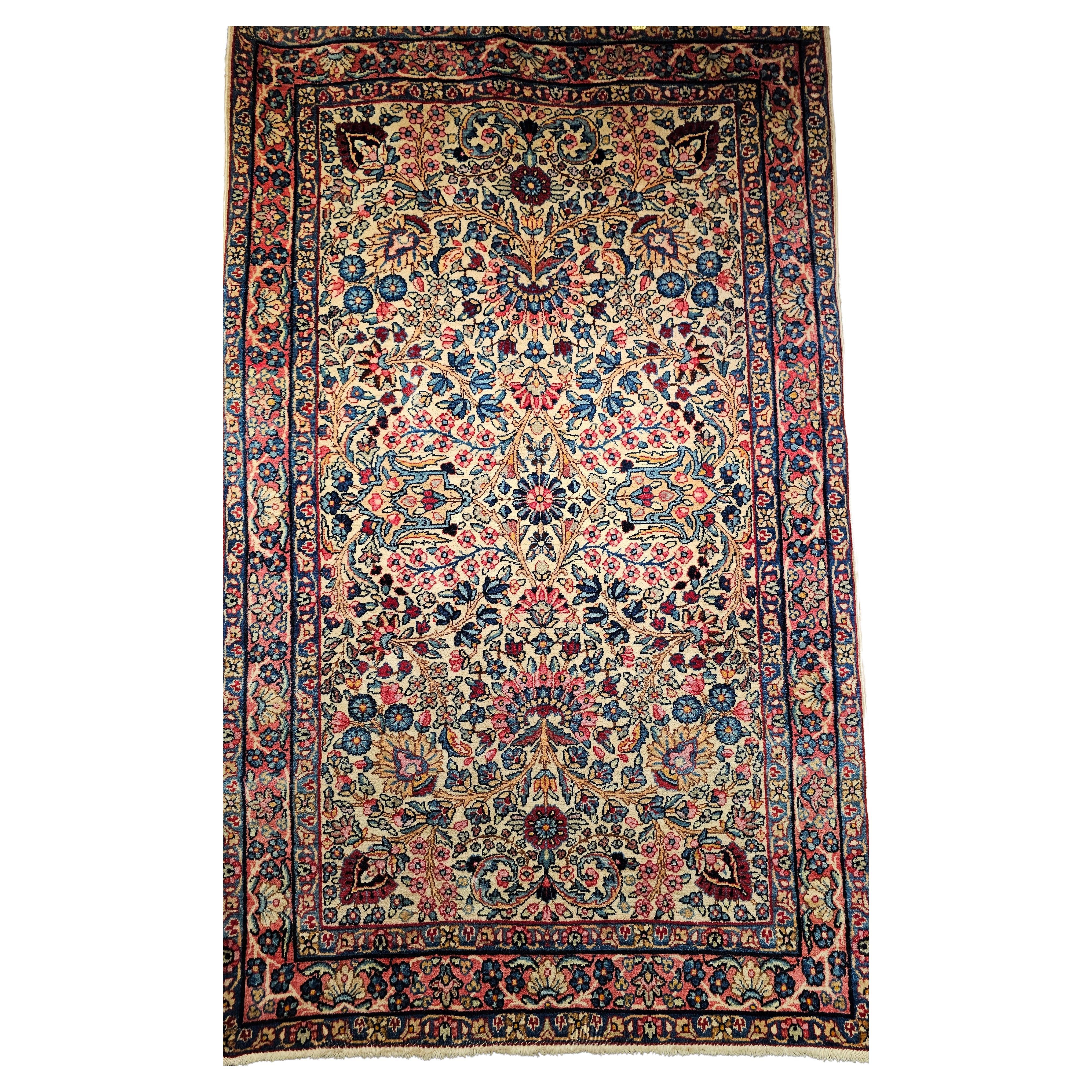 Vintage Persian Kerman Lavar Area Rug in Ivory, Blue, Pink, Red, Yellow For Sale
