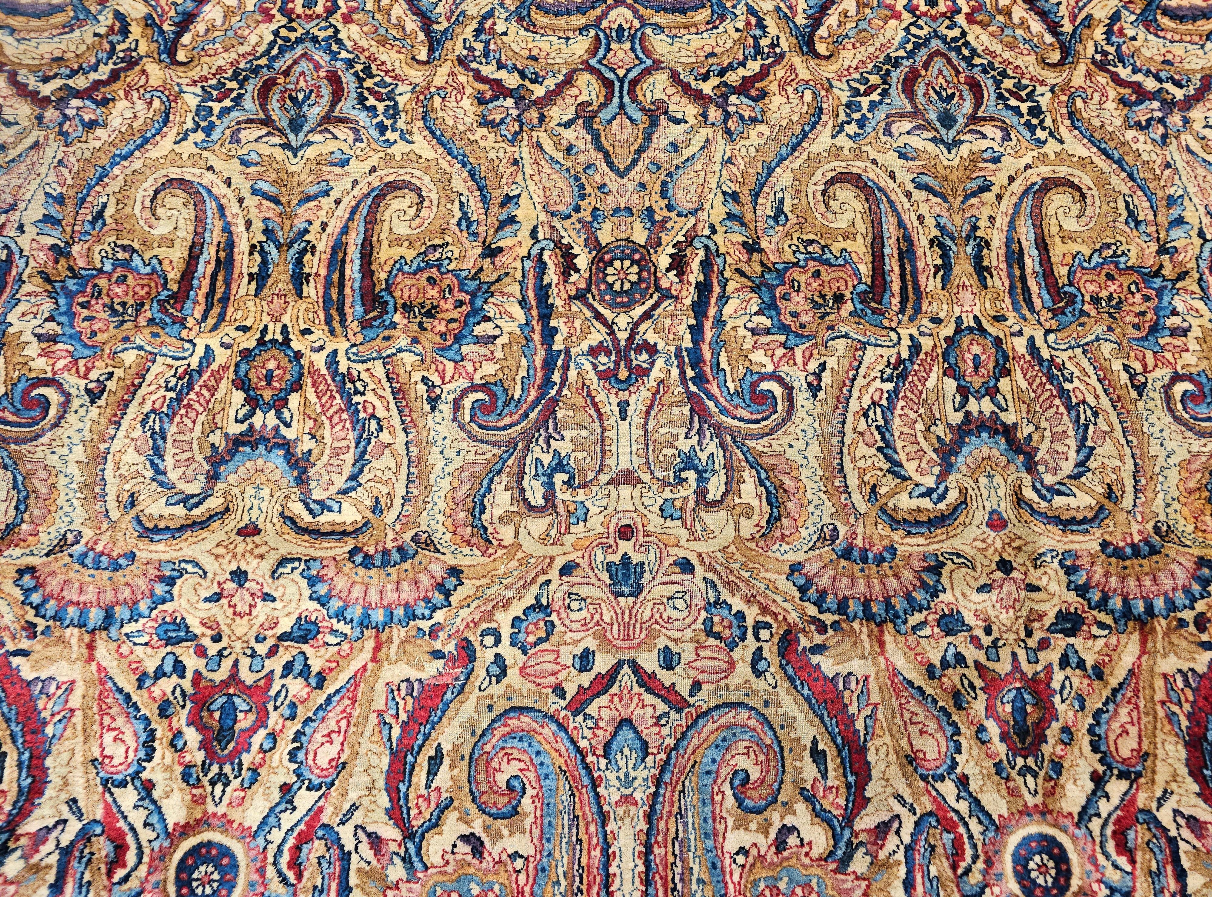Wool Vintage Persian Kerman Lavar in All-Over Paisley Pattern in Ivory, Blue, Red For Sale
