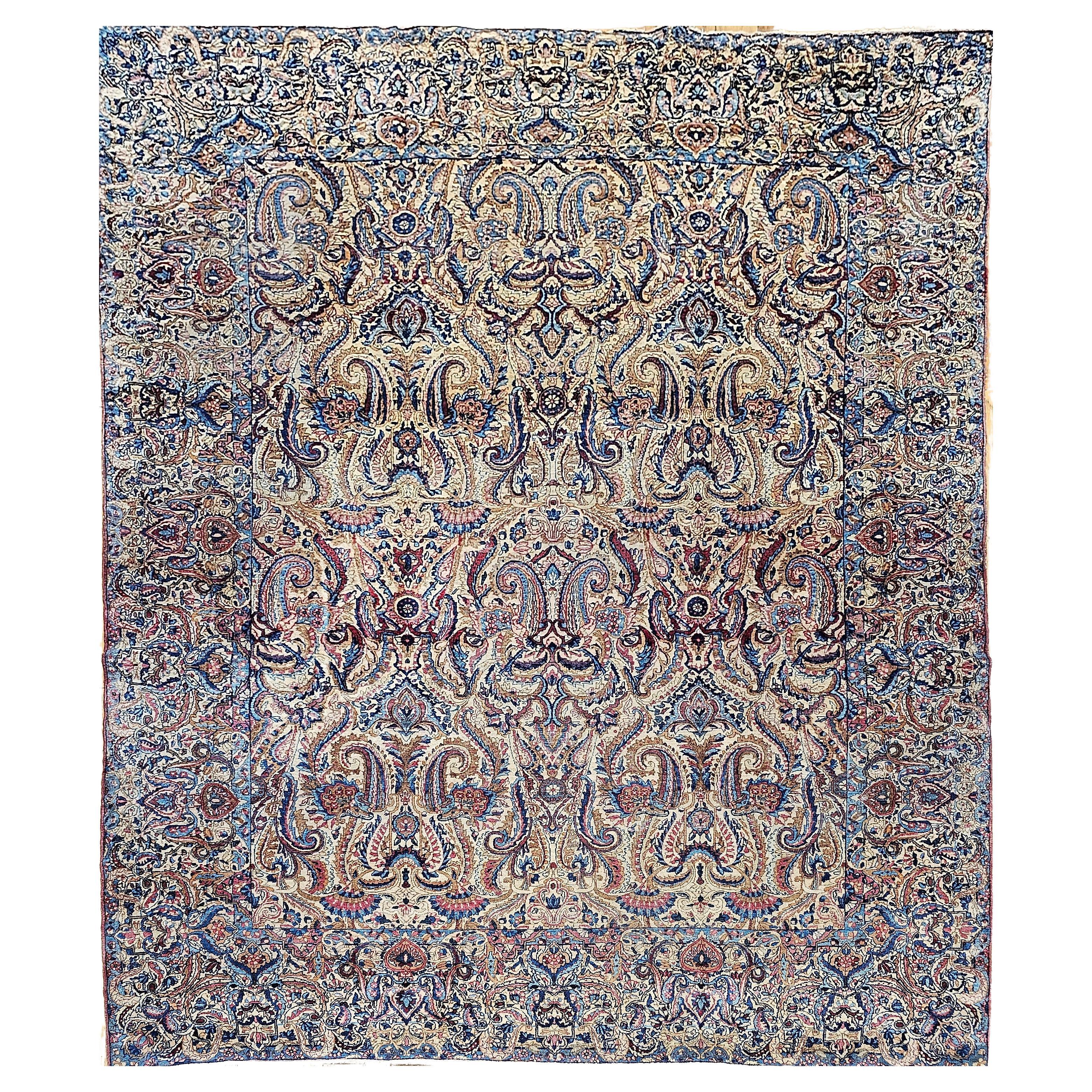 Vintage Persian Kerman Lavar in All-Over Paisley Pattern in Ivory, Blue, Red For Sale