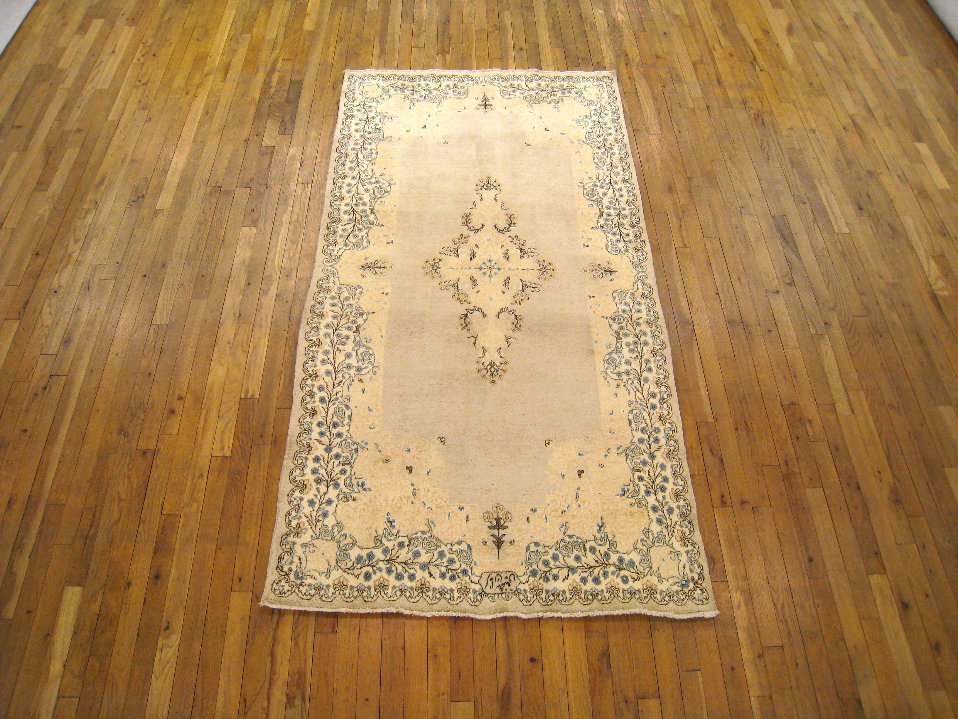 A vintage Persian Kerman rug, circa 1930, size 7'8