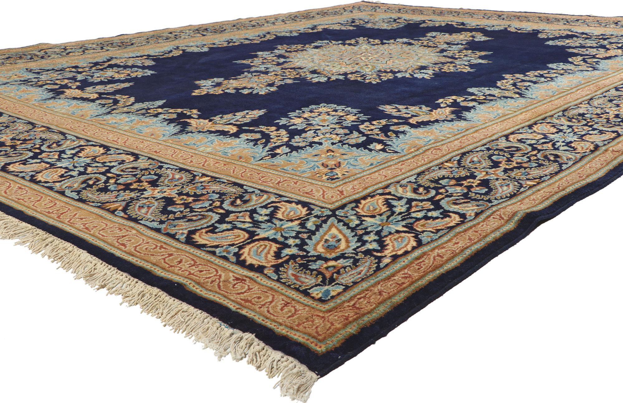 78528 Vintage Persian Kerman Rug, 10'03 x 13'05.
Displaying an impressive array of floral elements with incredible detail and texture, this hand knotted vintage Persian Kerman rug is a captivating vision of woven beauty. The timeless design and