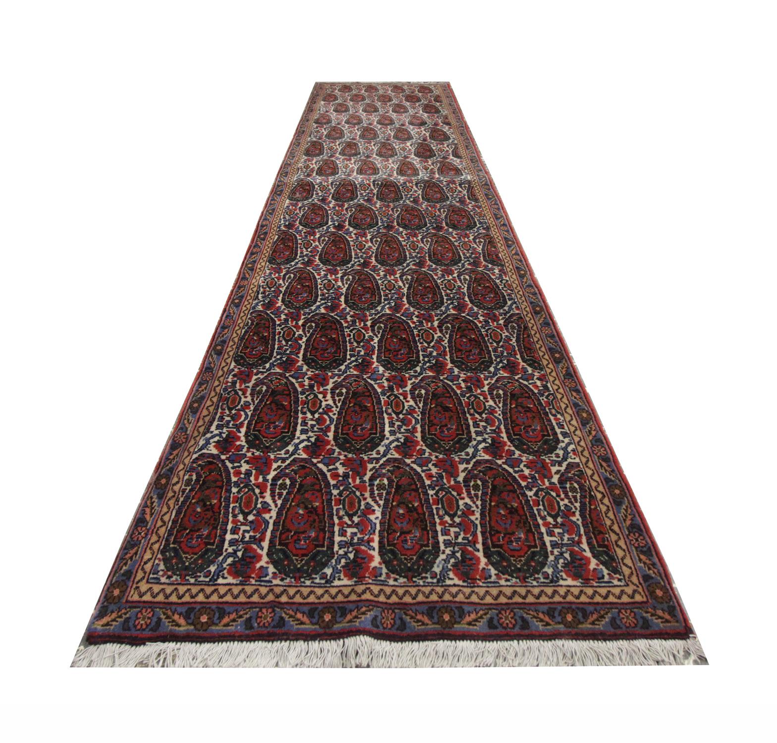 This glorious runner rug has been hand woven with a stunning paisley print. On a light background contrasts against the delicate detailing of the paisley pattern. Purples, reds and deep tones of brown have been used creating a beautiful eye-catching