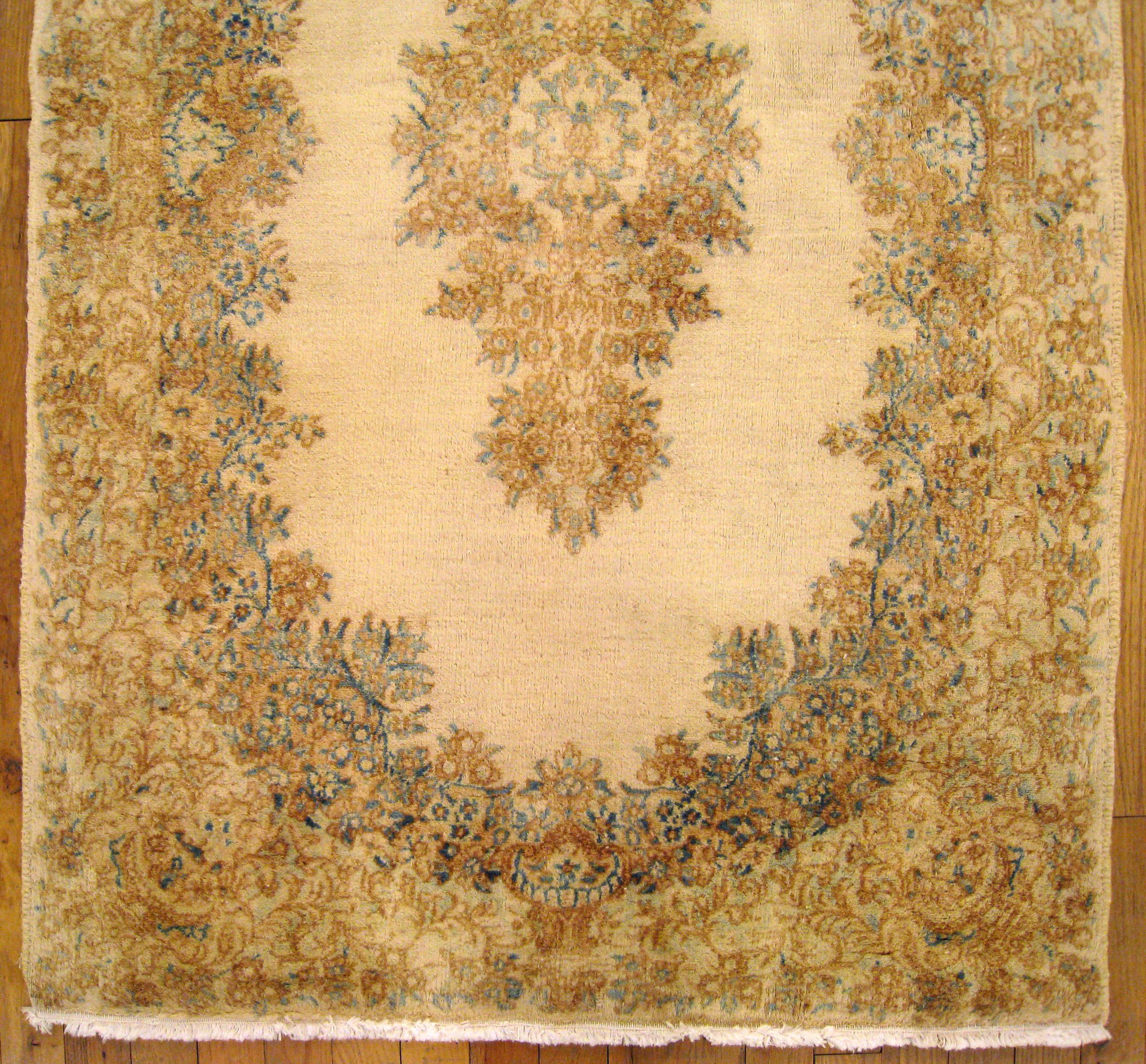 Hand-Knotted Vintage Persian Kerman Rug, in Small Size, with Soft Colors & Open Ivory Field For Sale