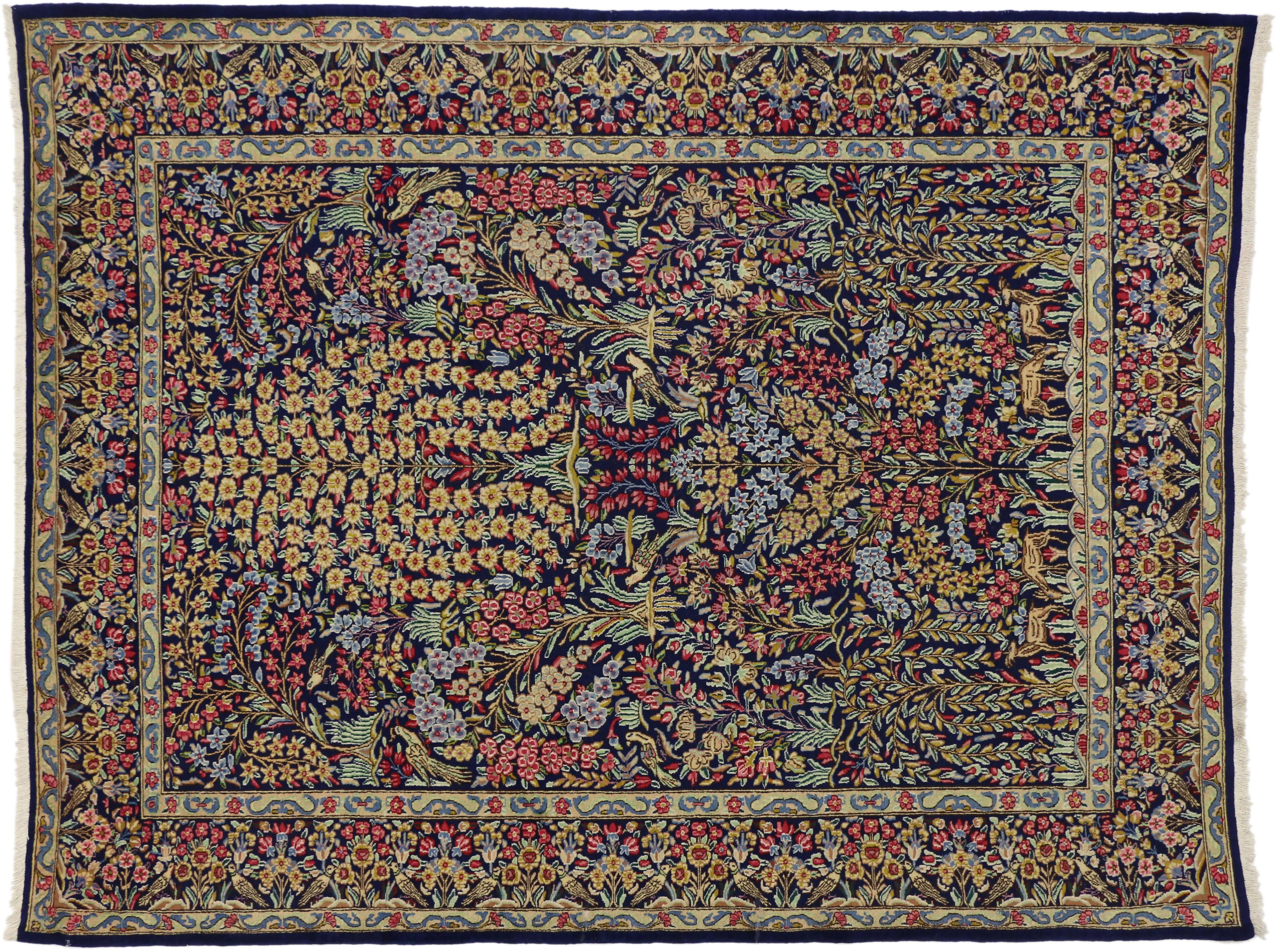 76184 Vintage Persian Kerman Rug with Garden of Paradise Design 07'04 x 09'05. This highly desirable vintage Persian Kerman rug showcases the Garden of Paradise design in vibrant color palette illuminating its lively, composition. The garden of