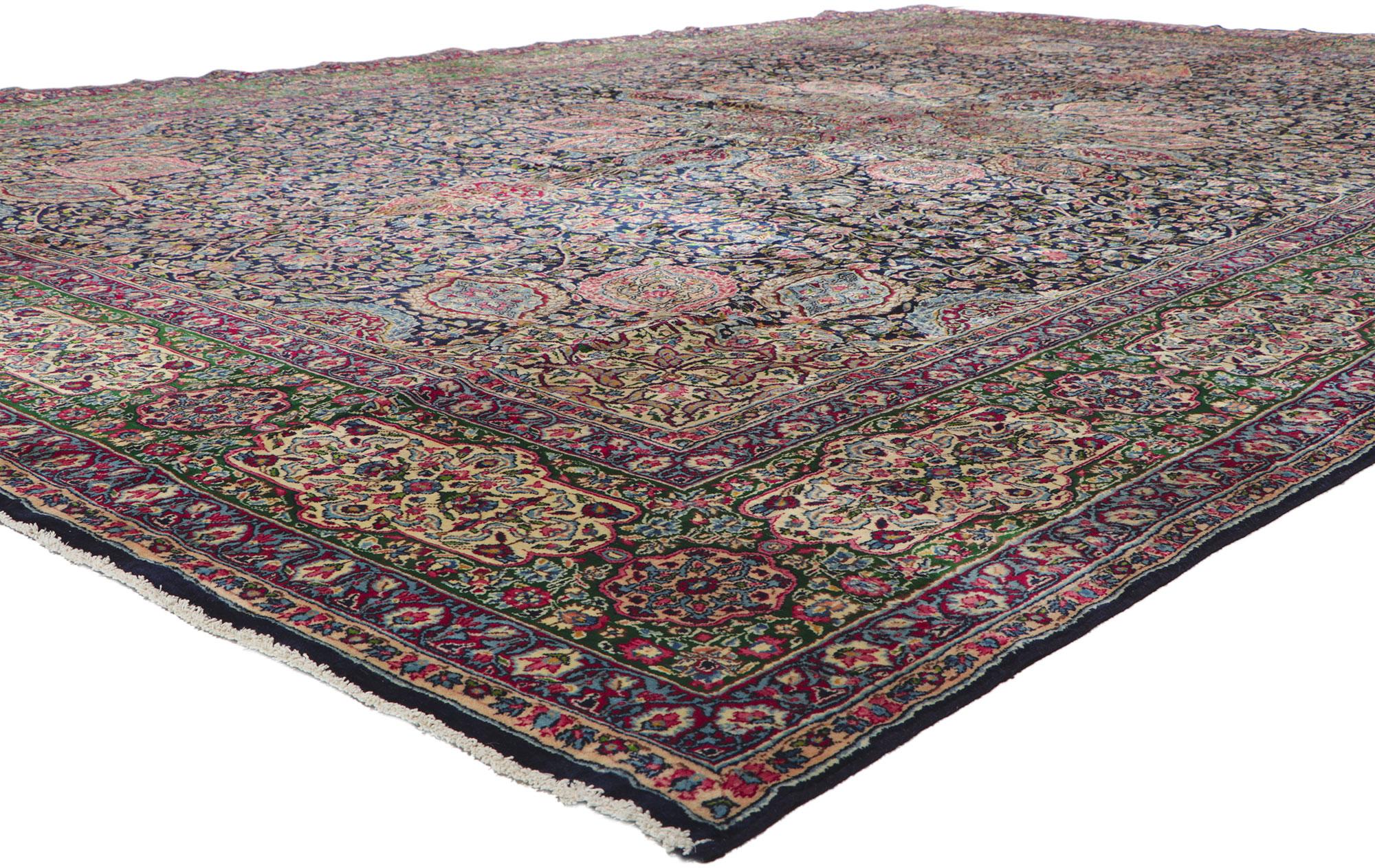 61108 Vintage Persian Kerman rug with The Ardabil Carpet Design, 11'02 x 16'03 Inspired from the Ardabil carpet from the Safavid dynasty, this hand-knotted wool vintage Persian Kerman rug is poised to impress. The abrashed navy blue field features a