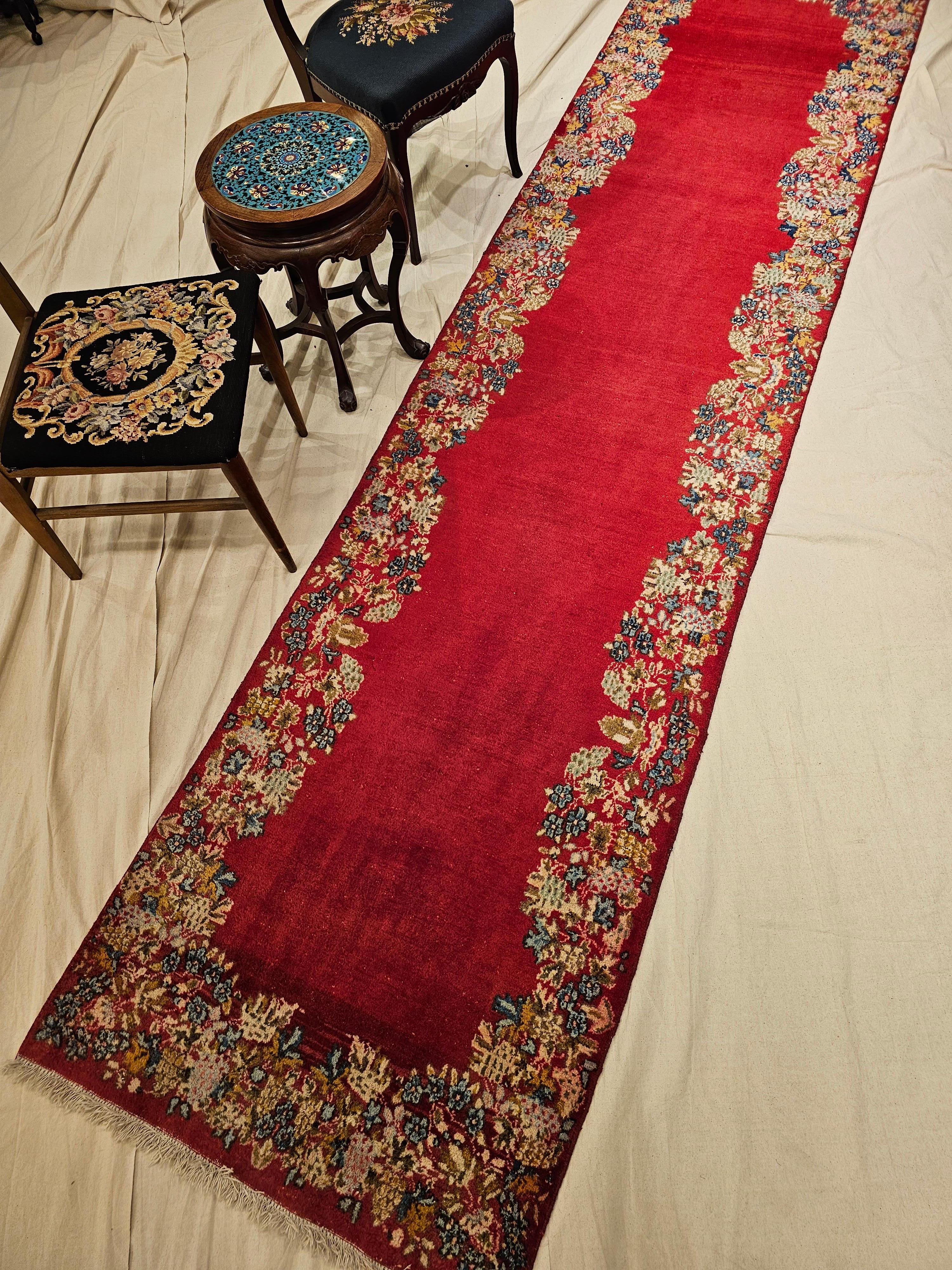 Wool  Vintage Persian Kerman Runner in Floral Design in Red, Yellow, Green, Blue For Sale