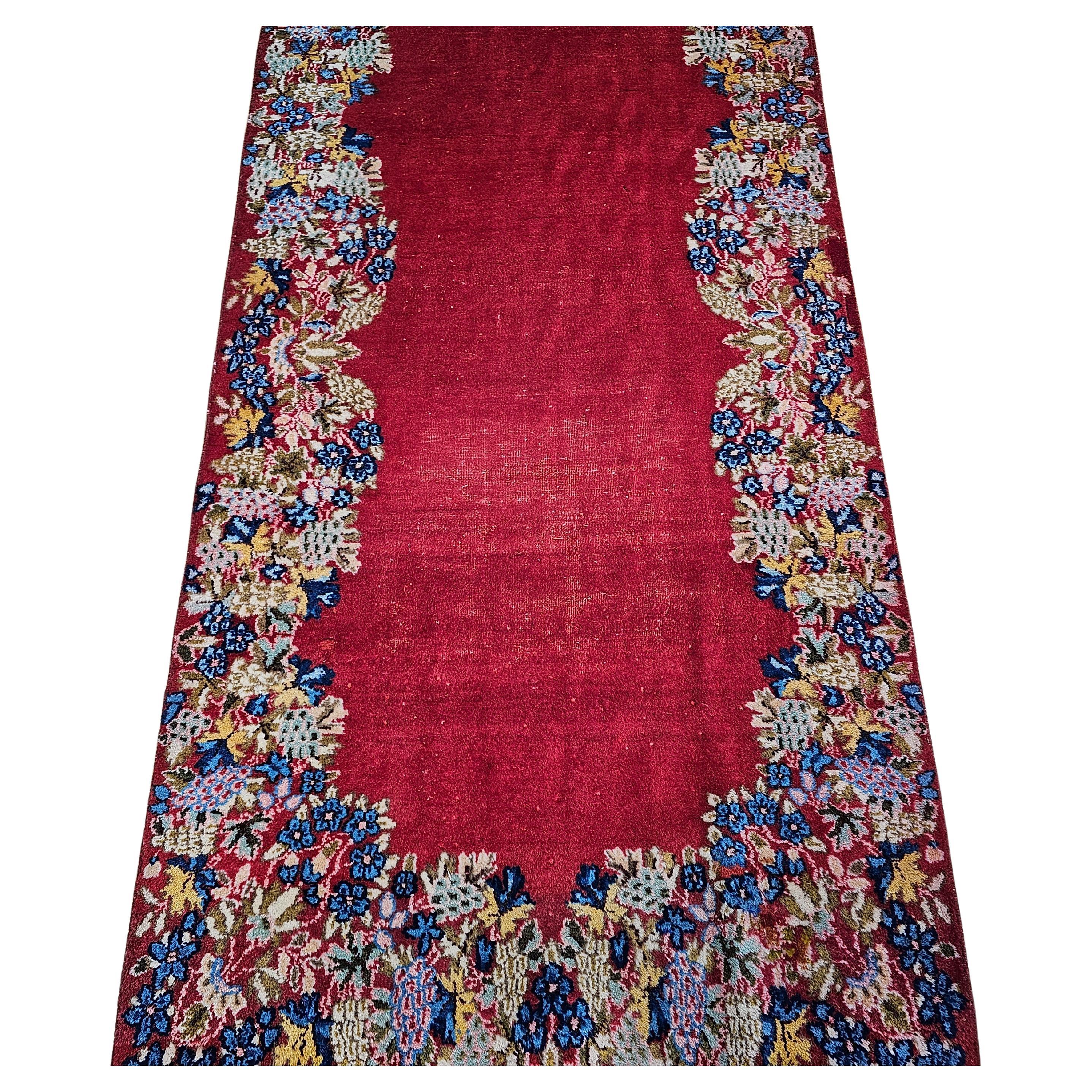 Vintage Persian Kerman Runner in Open Field Floral Pattern in Red, Blue, Green