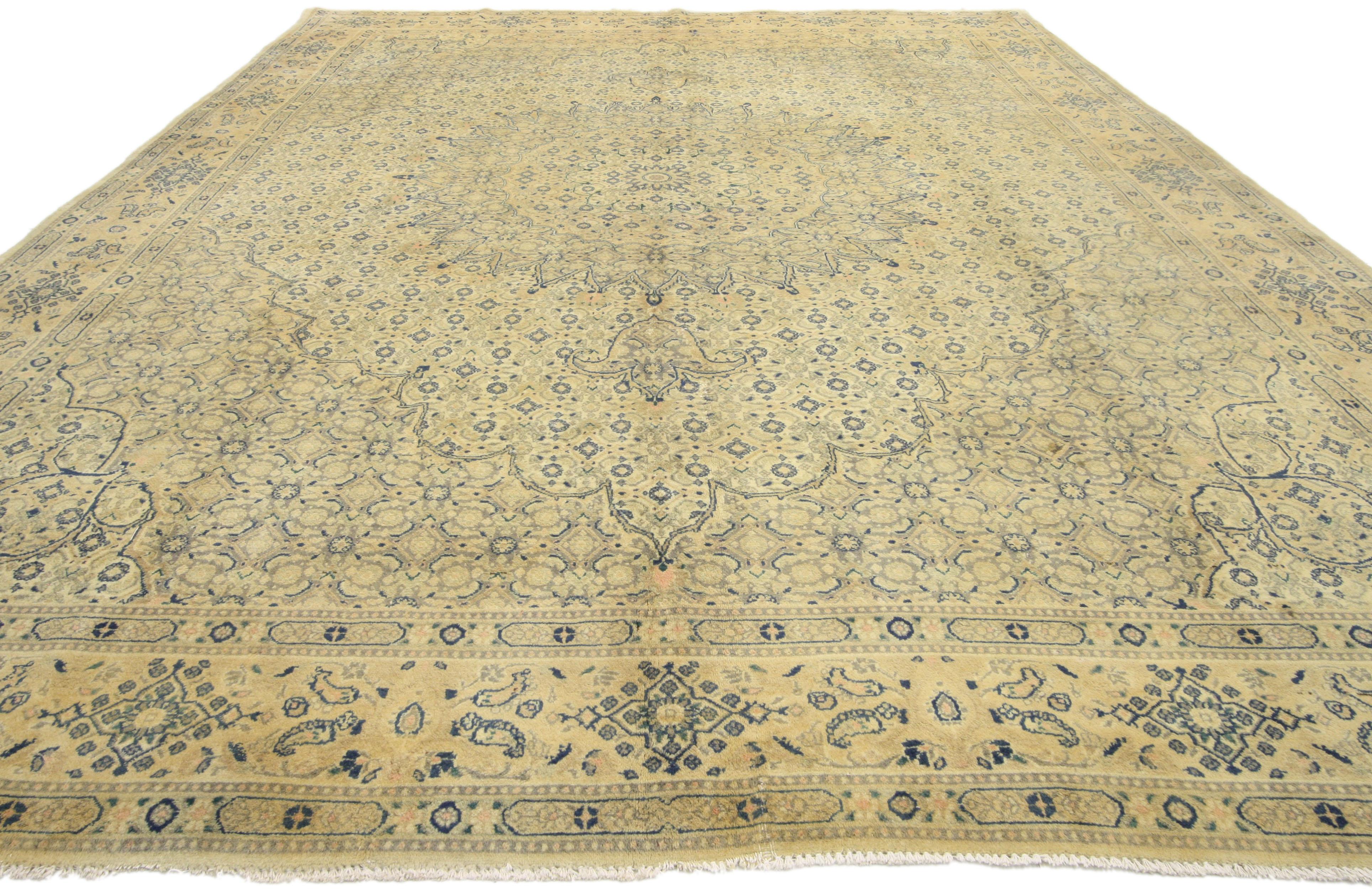 76584, vintage Persian Khorassan rug with French country style. Lustrous and decadent, a brilliant lobed orb ornaments the centre of this hand knotted wool vintage Persian Khorassan area rug with French Country style. Elaborate pendants extend from