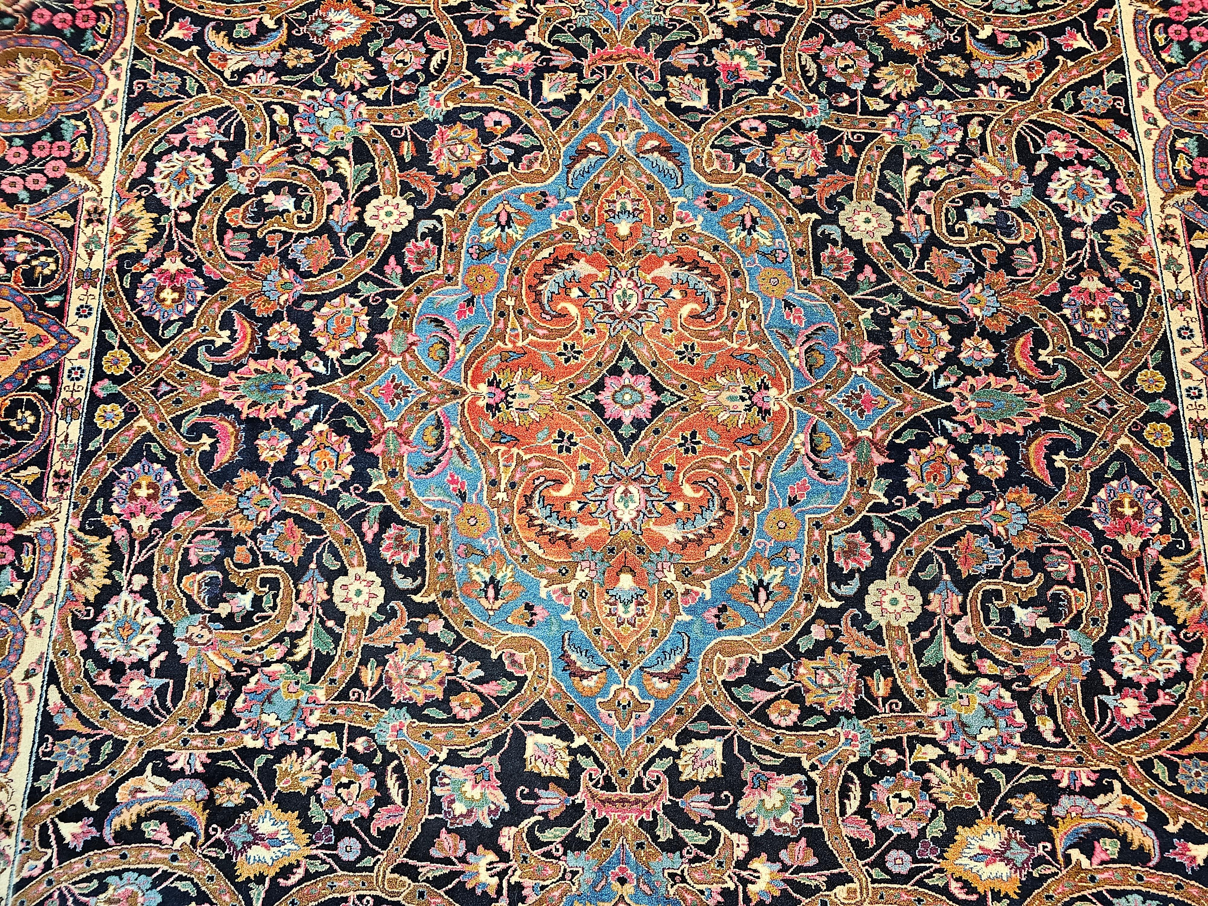 Vintage Persian Khorassan in Floral Pattern in Navy, Turquoise, Pink, Yellow In Good Condition For Sale In Barrington, IL