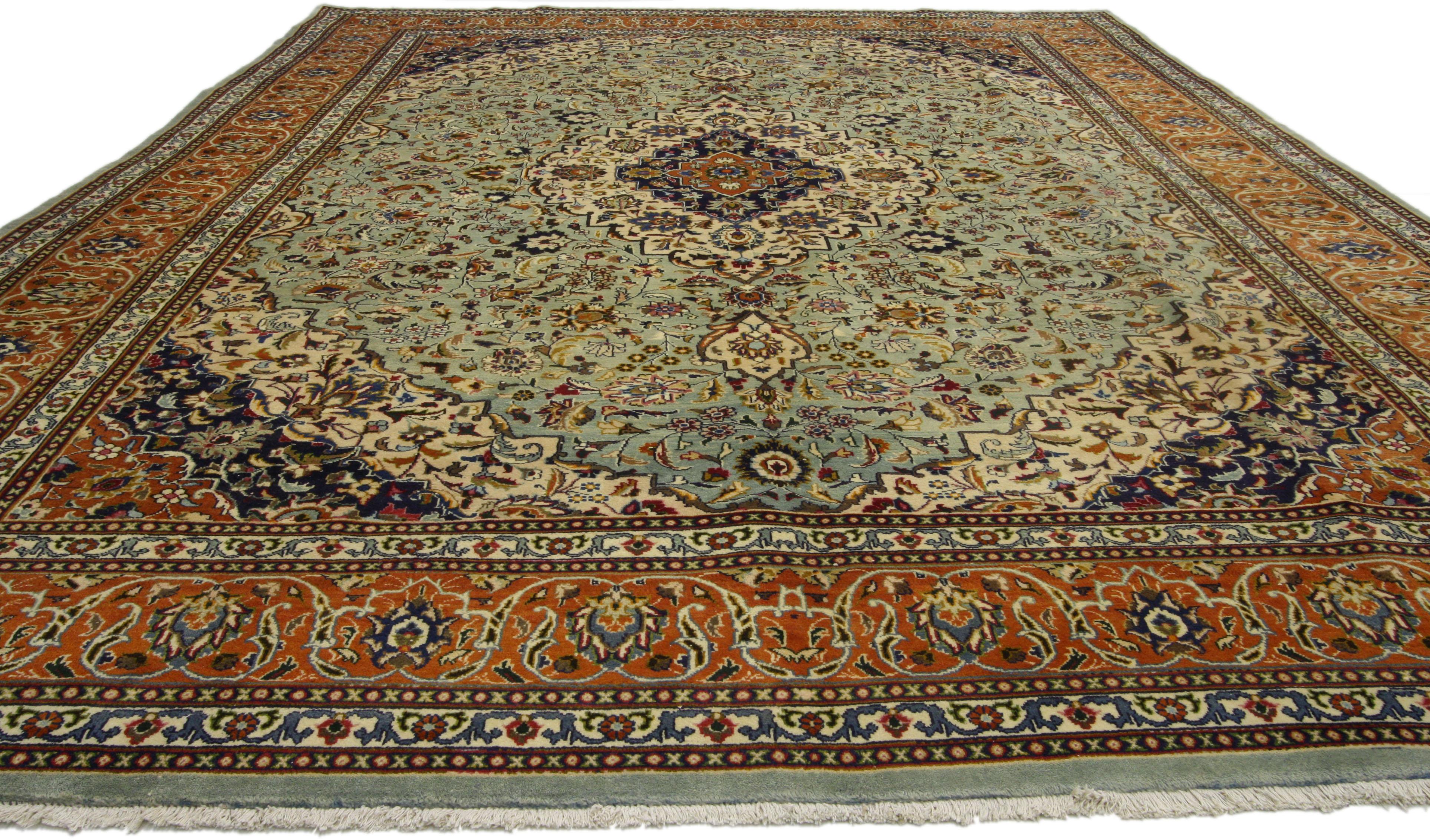 76496, vintage Persian Khorassan rug with traditional style. This hand-knotted wool vintage Persian Khorassan rug features a central lobed medallion and complementary spandrels with an all-over arabesque floral pattern. It is surrounded by a