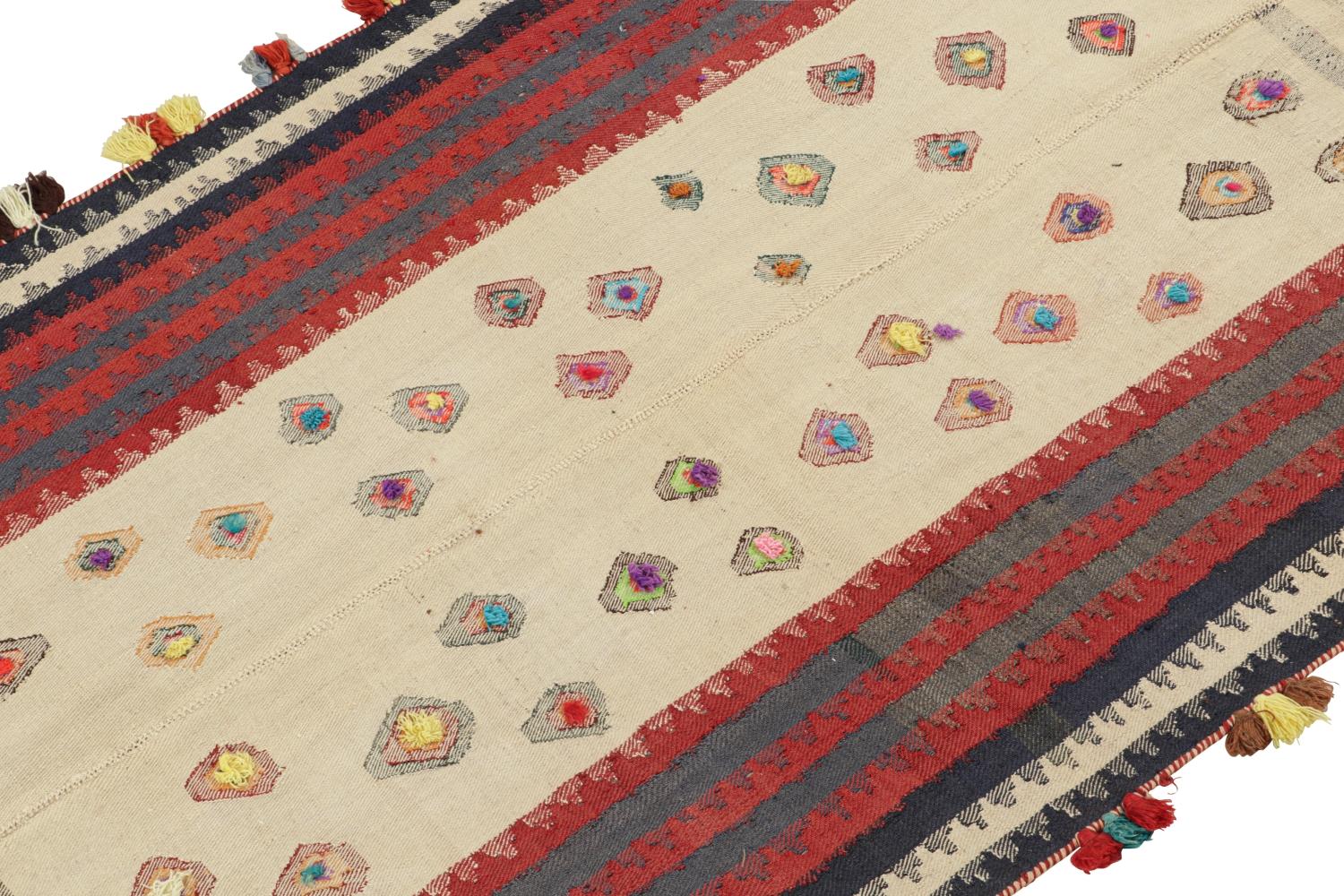 This vintage 4x6 Persian Kilim is handwoven in wool, and originates circa 1950-1960.

On the Design: 

This design remarks the panel-weaving technique, in which tribal weavers combine multiple flatweaves into larger Kilims. Its colorway favors