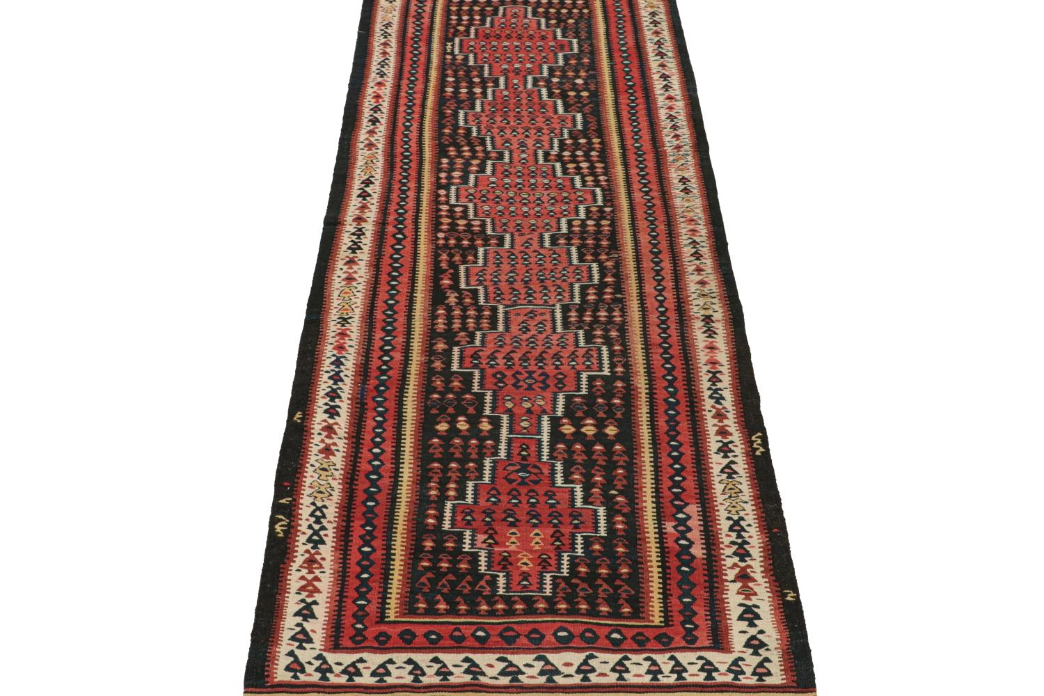 Hand-Knotted Vintage Persian Kilim in Black and Red with Geometric Patterns For Sale