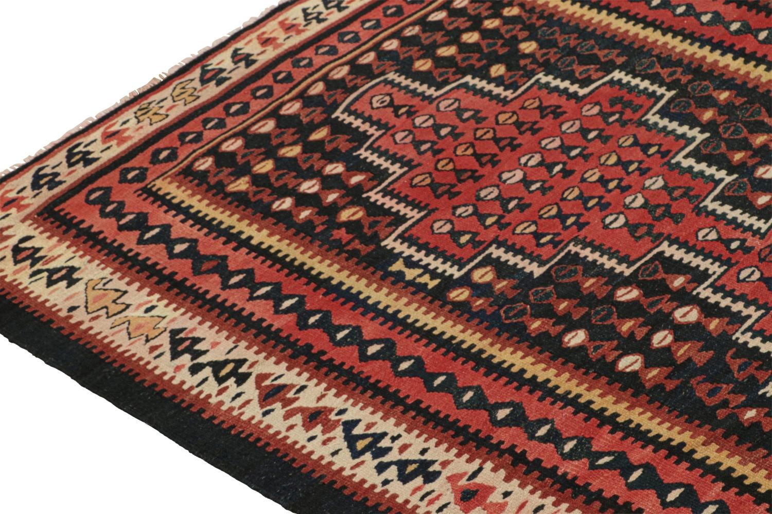 Mid-20th Century Vintage Persian Kilim in Black and Red with Geometric Patterns For Sale