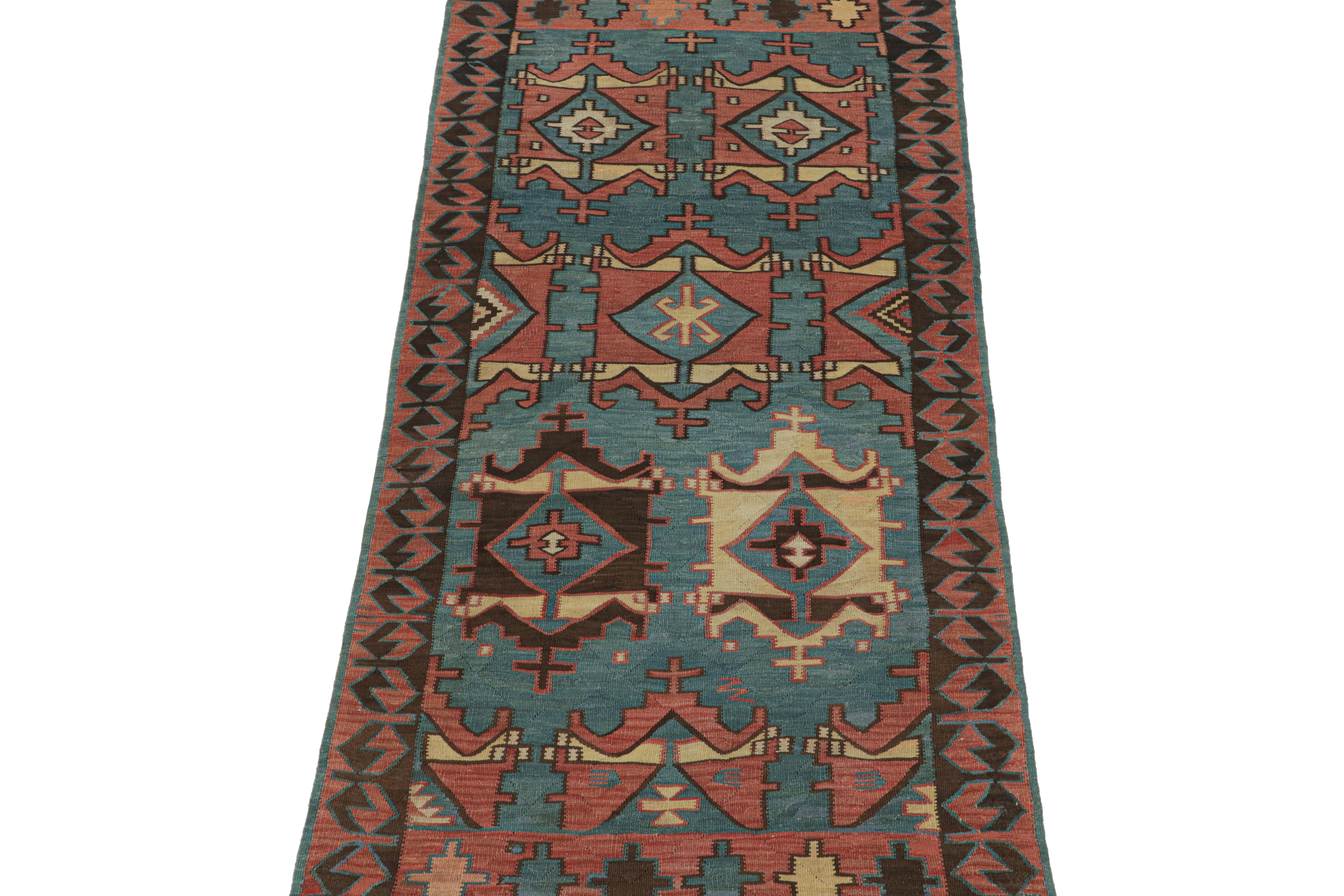 Mid-20th Century Vintage Persian Kilim in Blue & Red Tribal Patterns