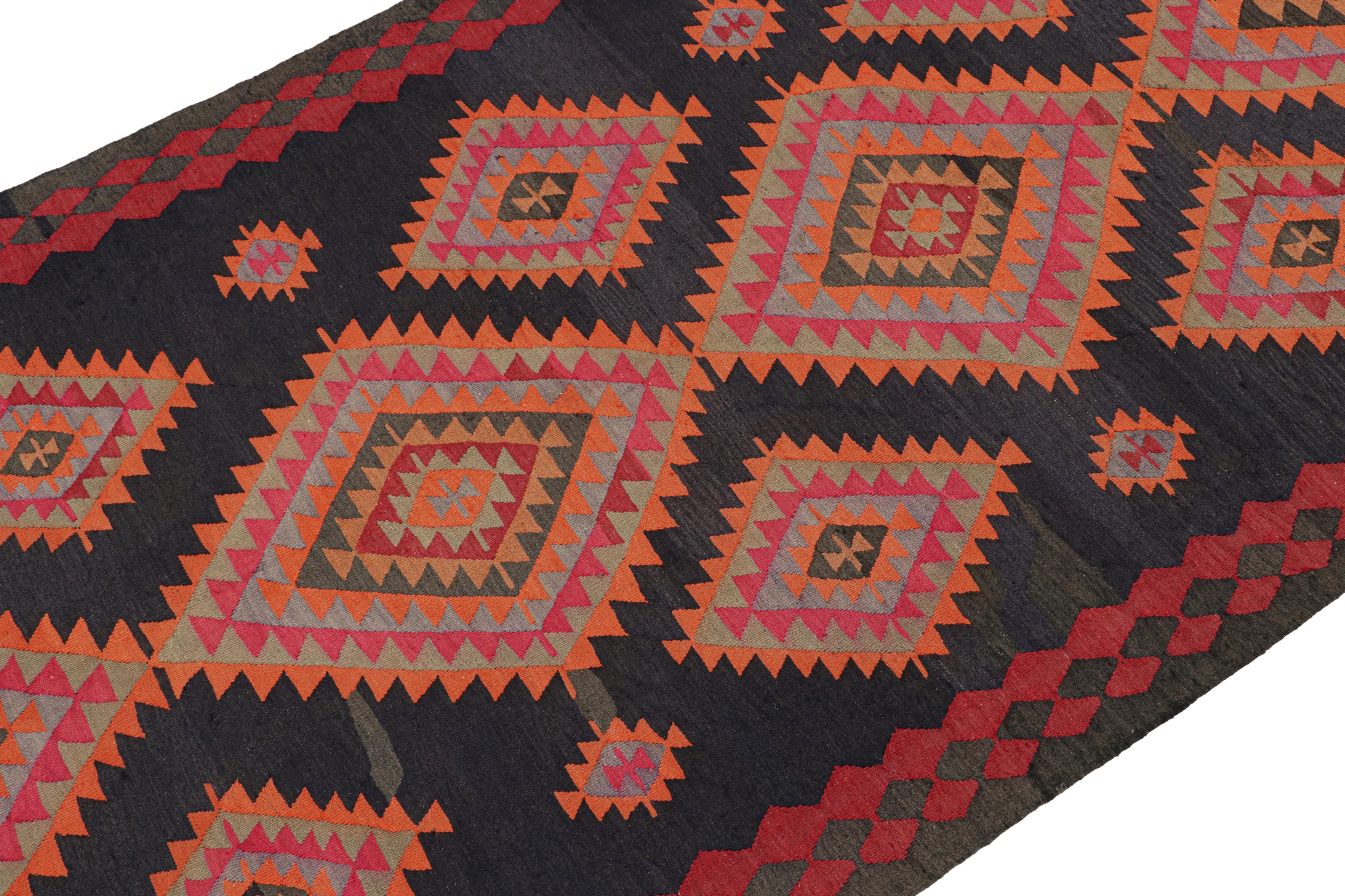 This vintage 6x13 Persian Kilim is a tribal rug from Meshkin—a small northwestern village known for its fabulous works. Handwoven in wool, it originates circa 1950-1960.

On the Design:

The design enjoys vibrant medallions on a deep midnight