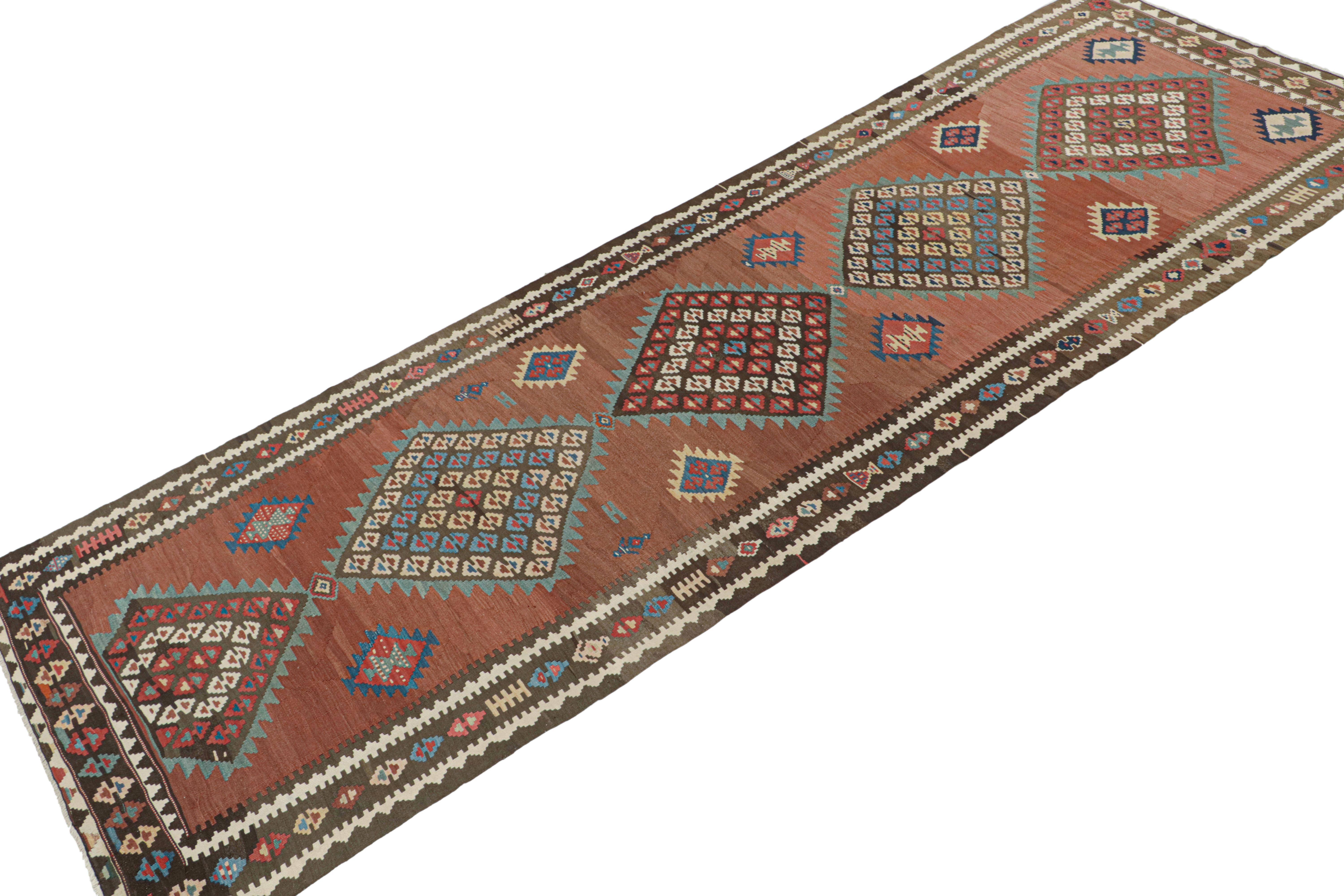 Tribal Vintage Persian Kilim in Brick Red with Medallion Patterns by Rug & Kilim For Sale