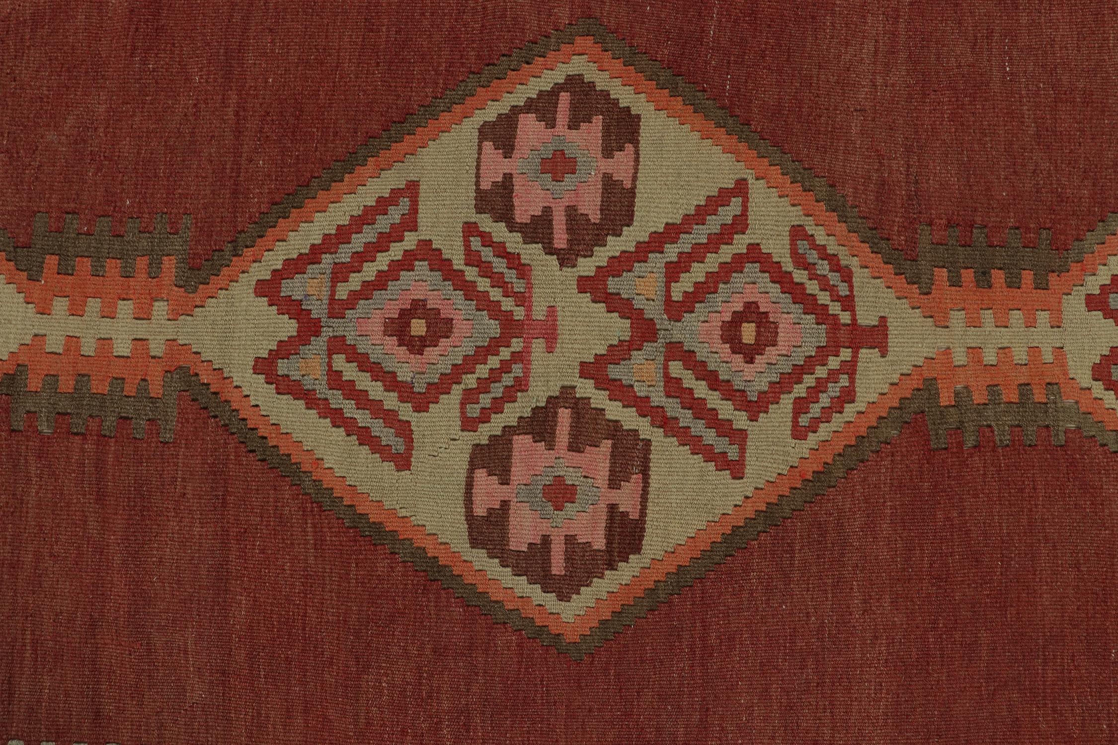 Mid-20th Century Vintage Persian Kilim in Brick Red with Polychromatic Medallions by Rug & Kilim For Sale