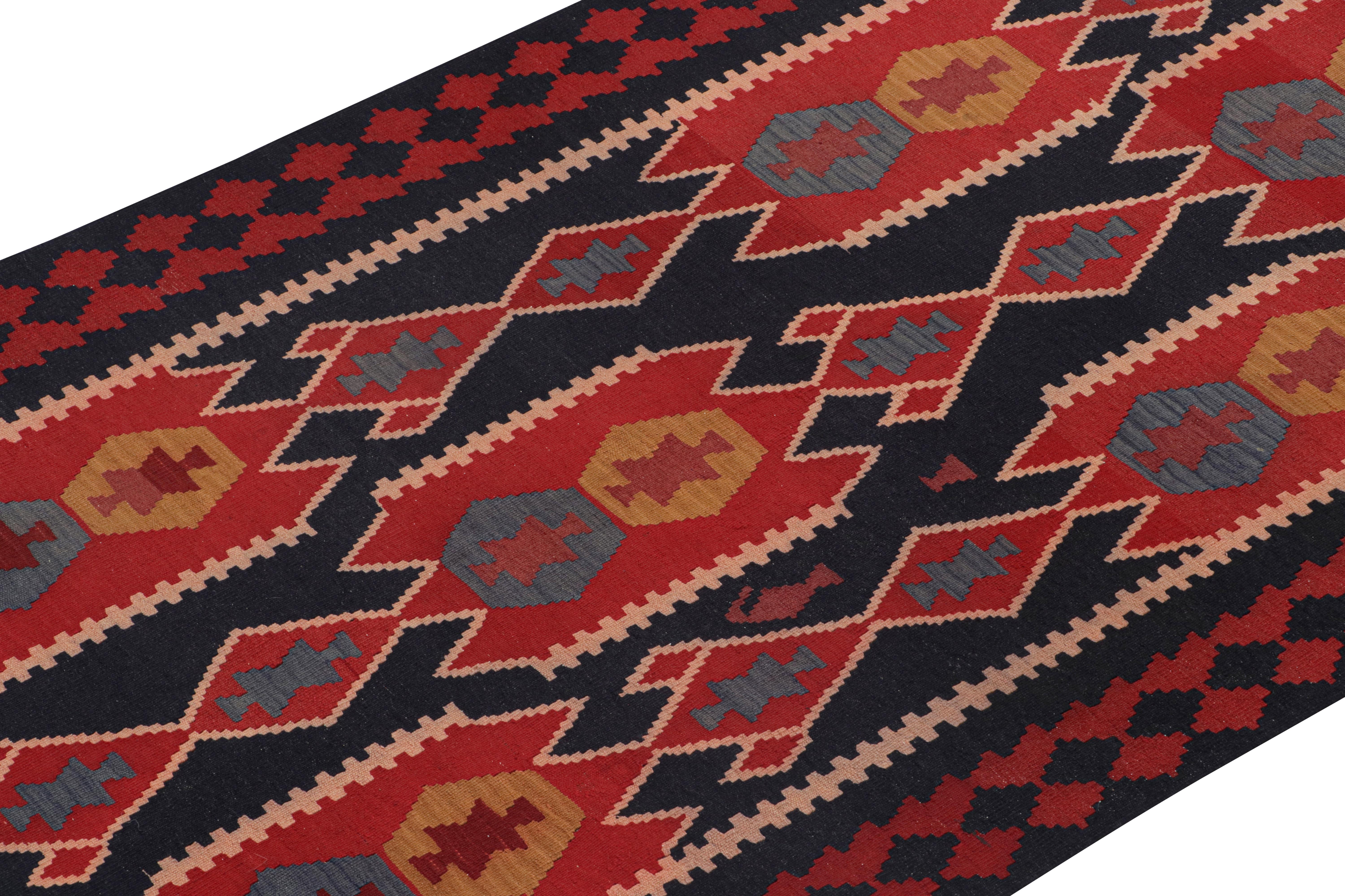 Hand-Knotted Vintage Persian Kilim in Navy Blue with Red Geometric Patterns by Rug & Kilim For Sale