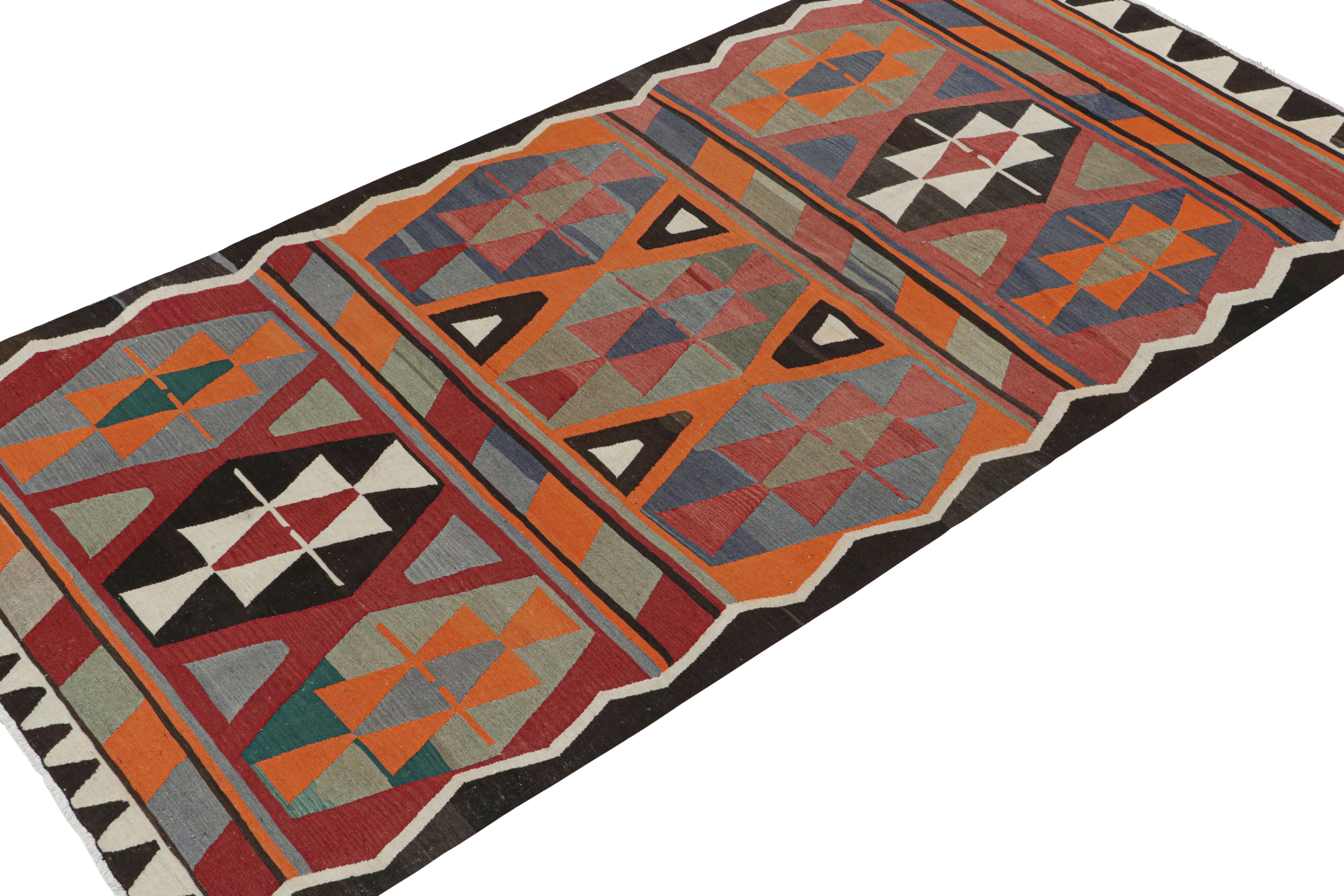 Tribal Vintage Persian Kilim with Polychromatic Geometric Patterns by Rug & Kilim For Sale