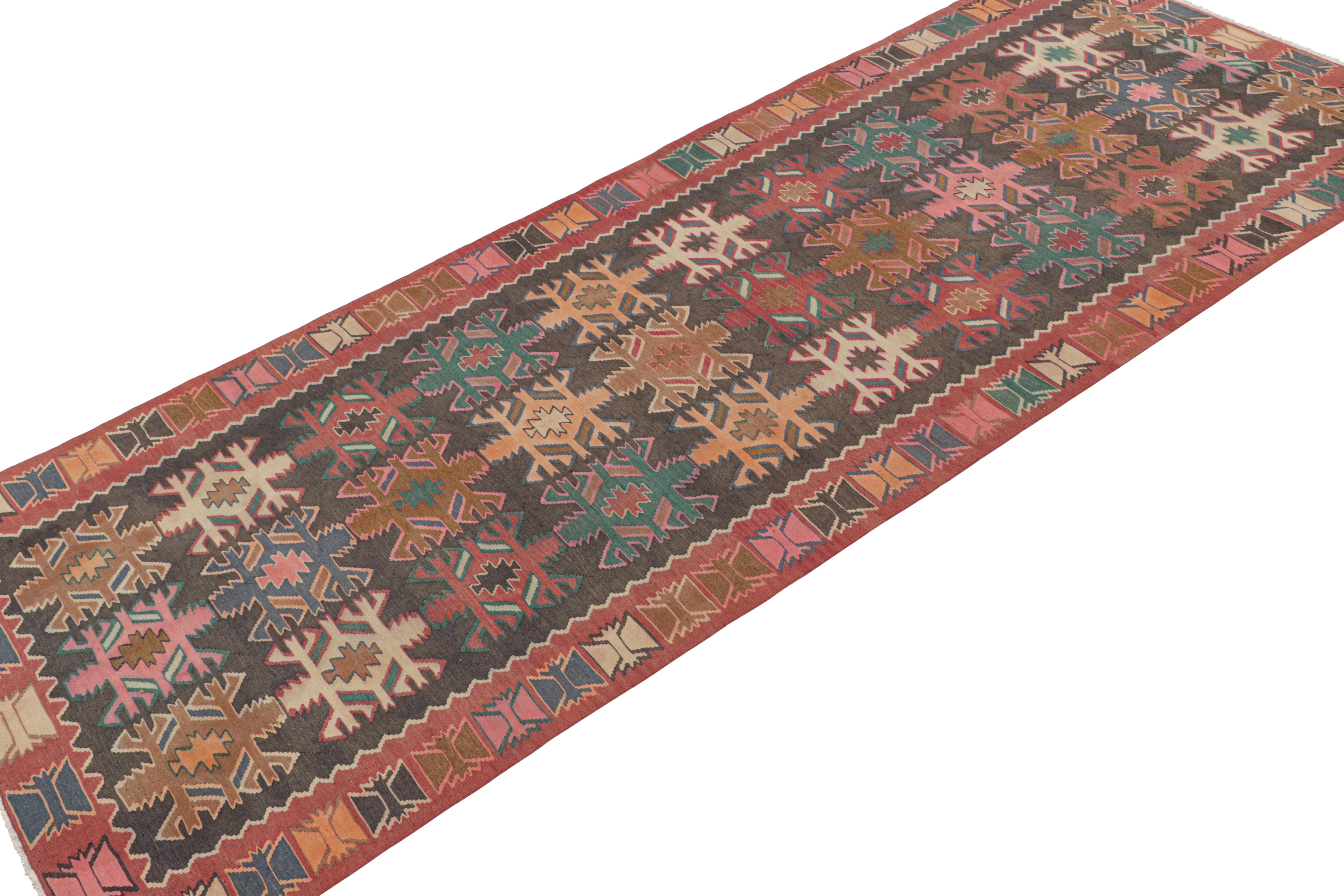 Tribal Vintage Persian Kilim in Polychromatic Geometric Patterns by Rug & Kilim For Sale