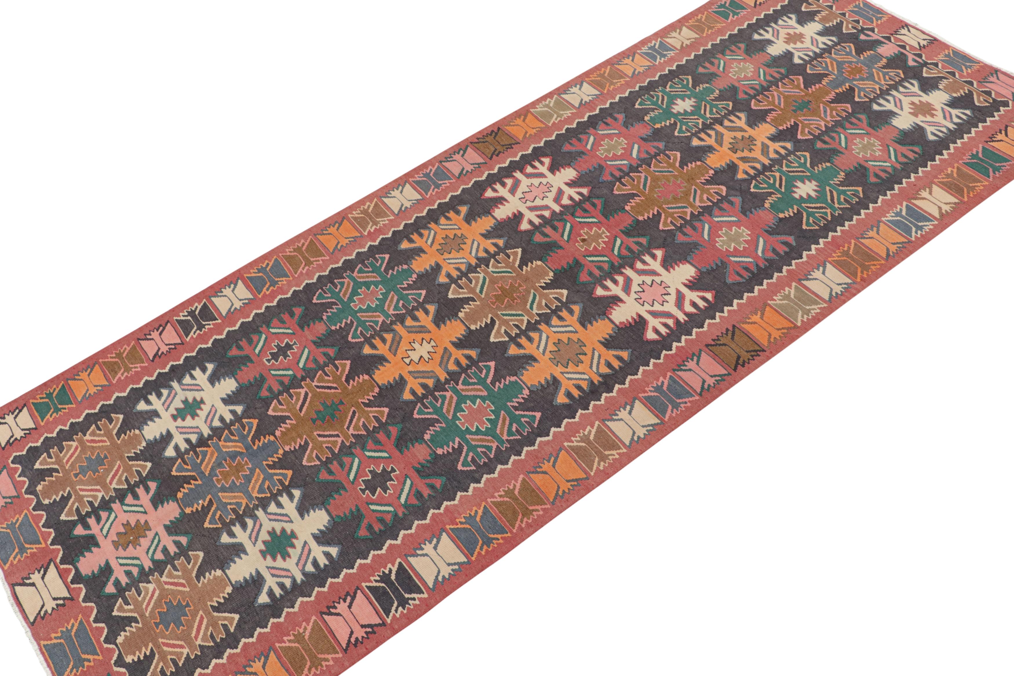 Hand-Woven Vintage Persian Kilim in Polychromatic Geometric Patterns by Rug & Kilim For Sale