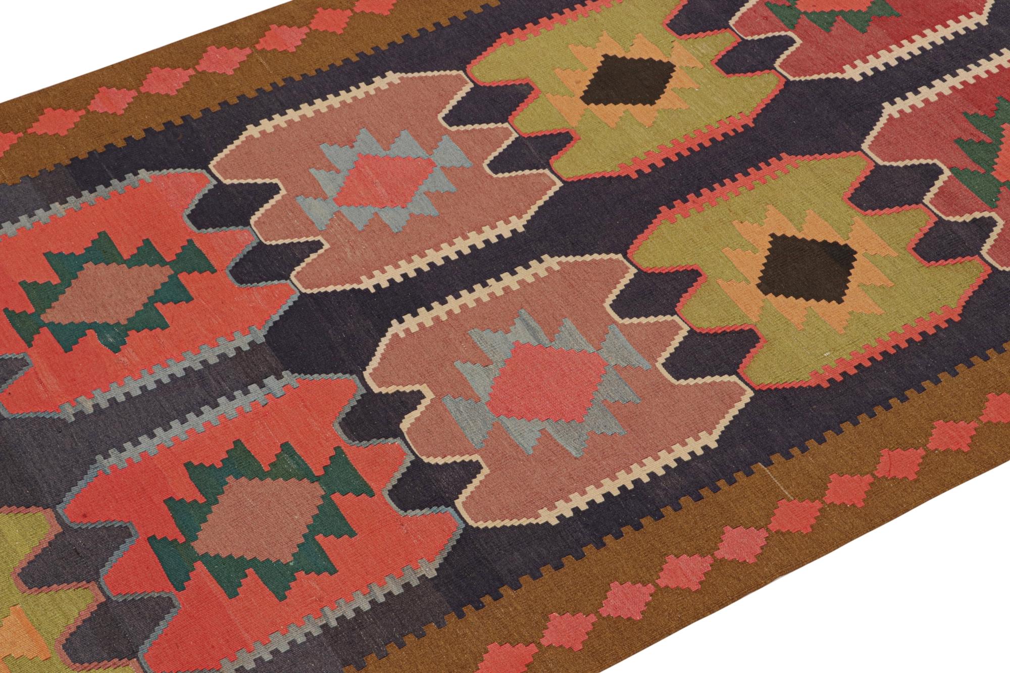 This vintage 5x9 Persian Kilim is a tribal rug from Meshkin—a small northwestern village known for its fabulous works. Handwoven in wool, it originates circa 1950-1960.

On the Design:

The design enjoys polychromatic geometric patterns on an