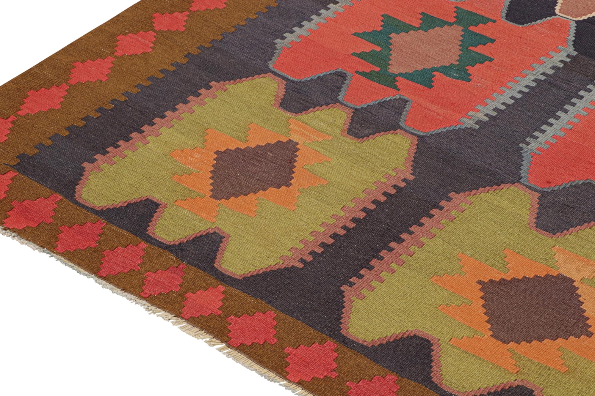 Mid-20th Century Vintage Persian Kilim in Polychromatic Geometric Patterns For Sale