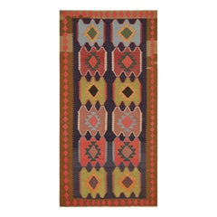 Kilim persiano vintage con motivi geometrici policromi
