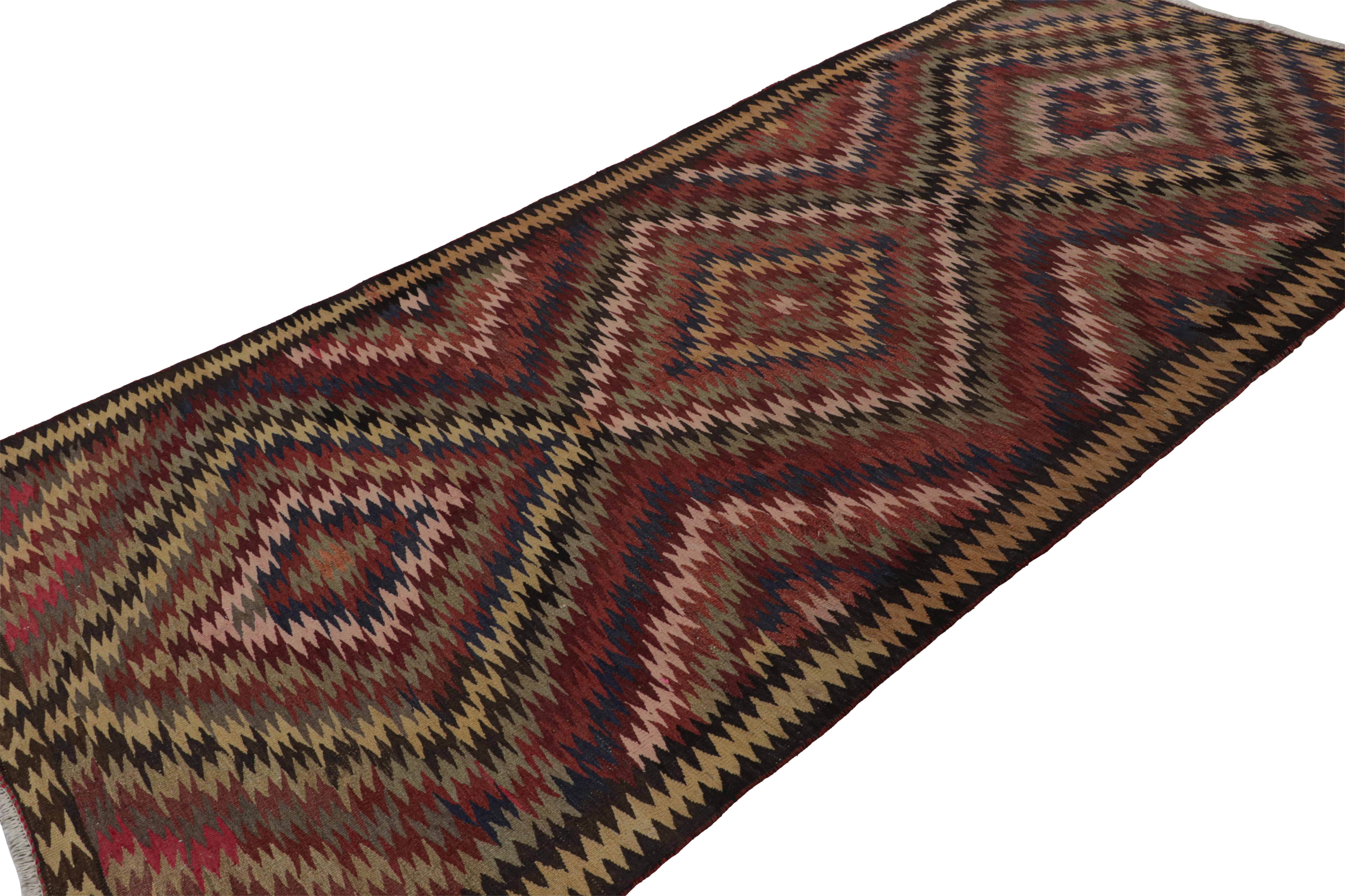 This vintage 5x11 Persian Kilim is the latest to join Rug & Kilim’s selection of vintage flatweaves. 

On the Design:

Handwoven in wool circa 1950-1960, the piece is full of intricate, playful details. The gorgeous tribal piece carries serrated